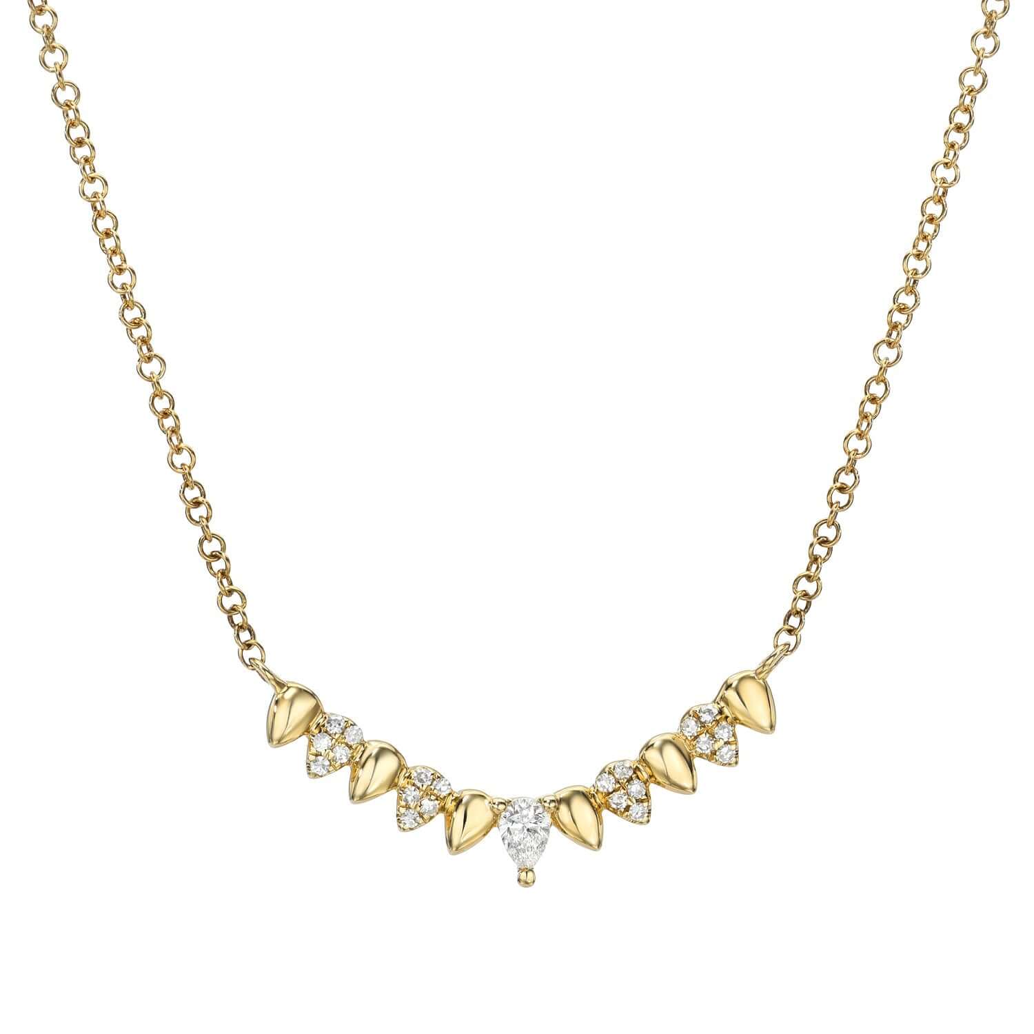 Explore the elegance of our Alternating Pear Shaped Graduated Necklace, featuring a gold chain adorned with leaf-shaped pendants and diamond-like stones, symmetrically designed for central sparkle. Contact us for customizations.