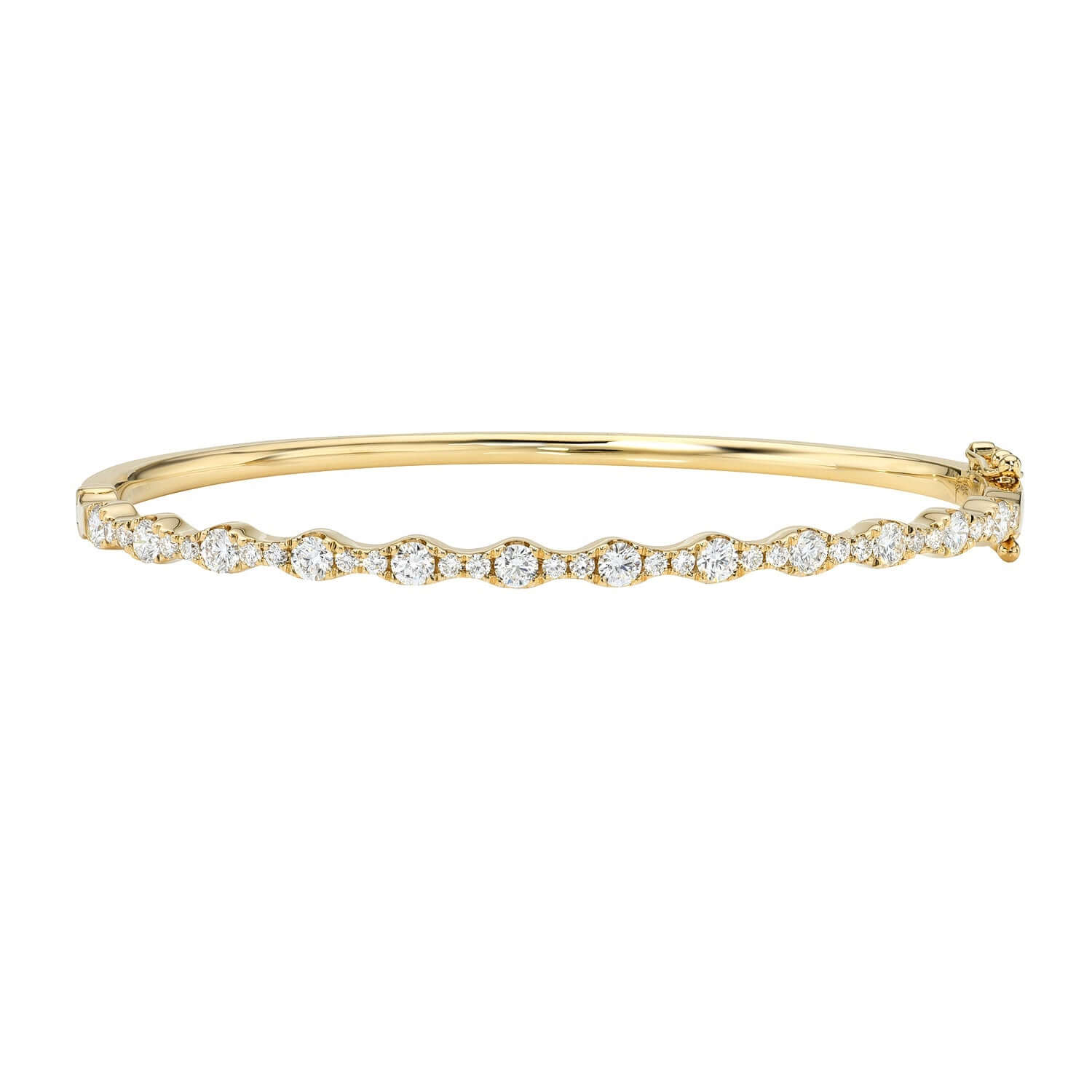 The Scalloped Diamond Bangle from Janet Heller Fine Jewelry is crafted in 14KT gold.  The bracelet features a scalloped design with prominent round diamonds linked by pairs of smaller diamonds.  The bangle can be stacked or worn on its own.