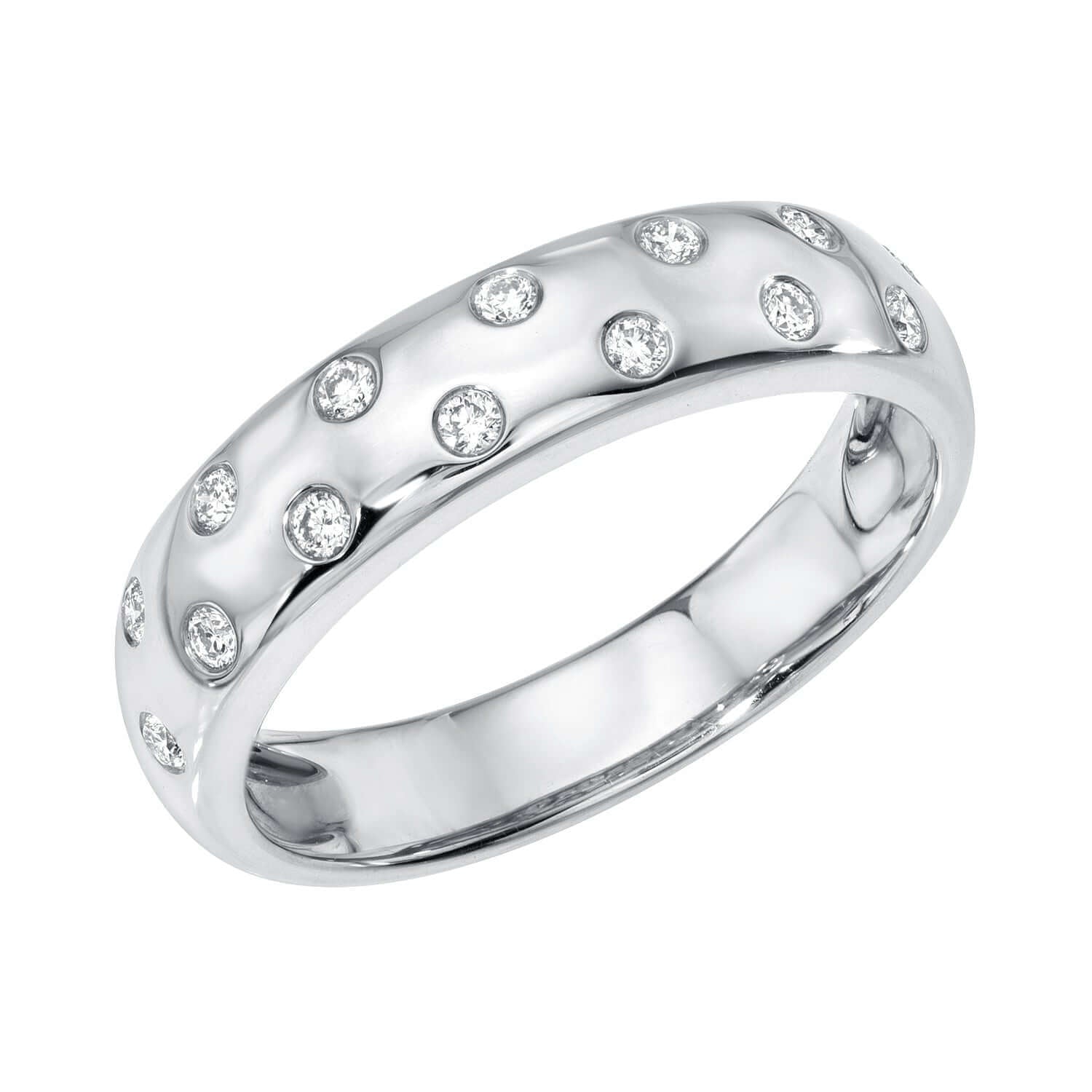 The Scattered Diamond Ring by Janet Heller Fine Jewelry features small round diamonds set in polished silver for a dotted look. Available in multiple sizes; preorder now for a custom fit.