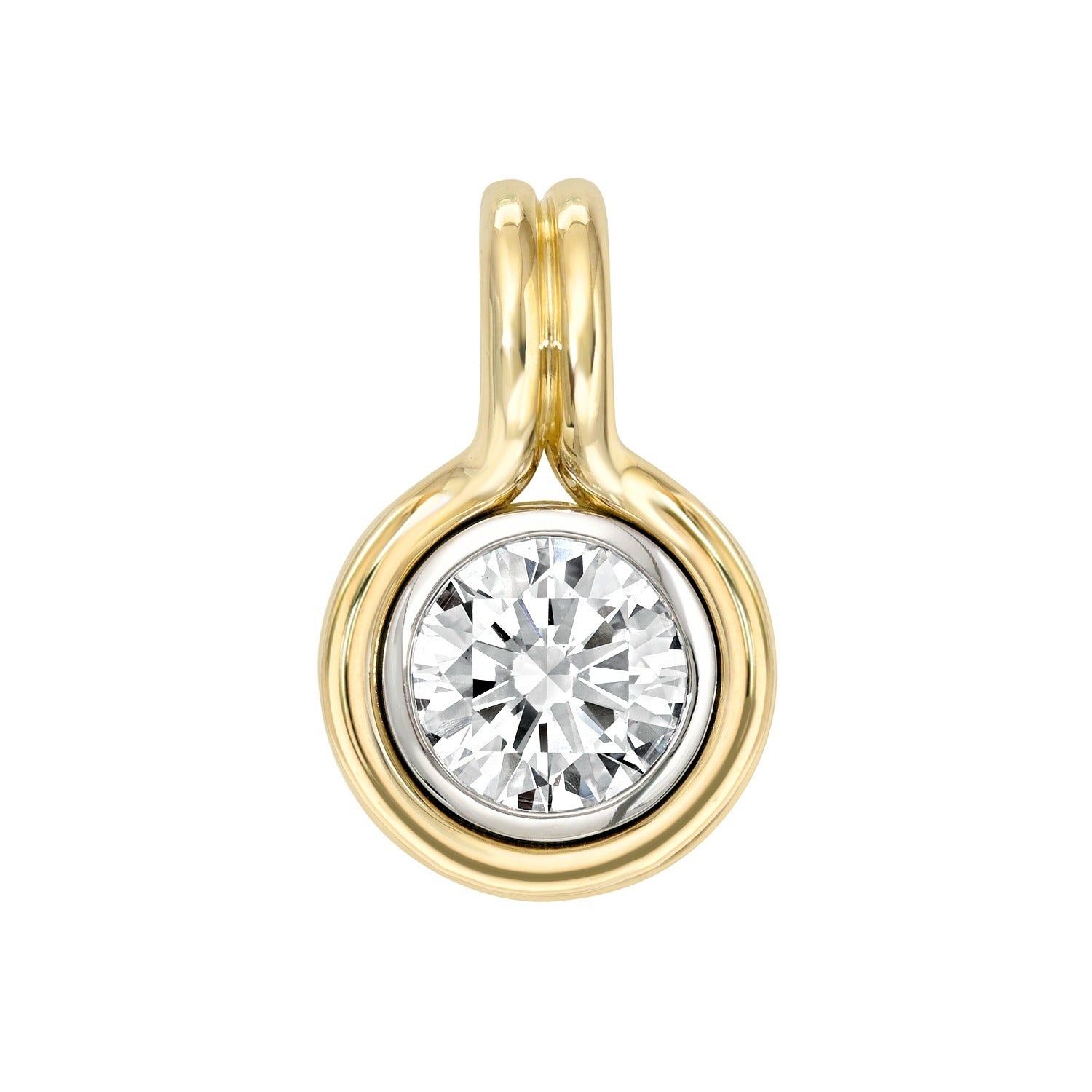 Introducing the Lab Grown Round Diamond Bezel Charm—a gold pendant showcasing a round, bezel-set lab grown diamond at its center, encased in a smooth, circular gold frame and finished with a double loop at the top to attach to your favorite necklace.