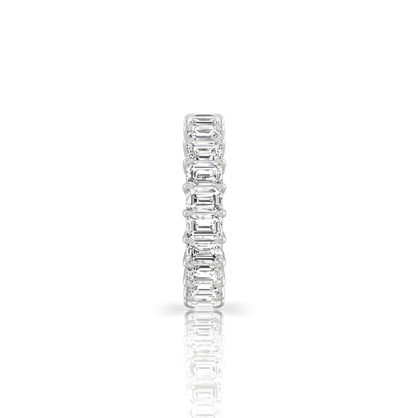 The Full Lab Grown Diamond Eternity Ring from Janet Heller Fine Jewelry, crafted in 18KT gold, features evenly spaced diamonds offered in various shapes and custom carat weights. The color of the diamonds is F and the clarity is VS. This is the perfect wedding band to be worn alone or stacked with your engagement ring.