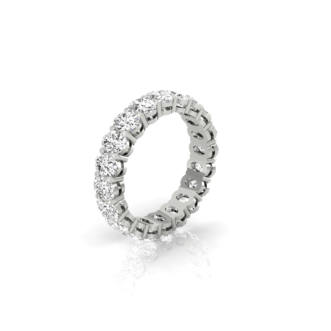 The Full Lab Grown Diamond Eternity Ring from Janet Heller Fine Jewelry, crafted in 18KT gold, features evenly spaced diamonds offered in various shapes and custom carat weights. The color of the diamonds is F and the clarity is VS. This is the perfect wedding band to be worn alone or stacked with your engagement ring.