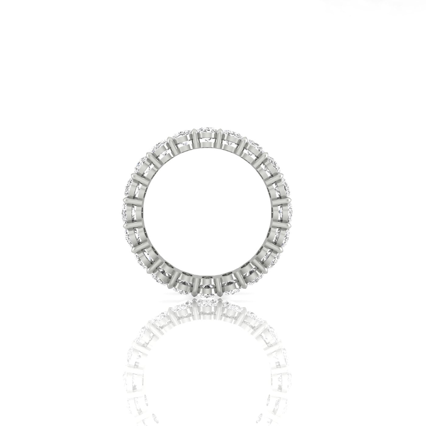 The Full Lab Grown Diamond Eternity Ring from Janet Heller Fine Jewelry, crafted in 18KT gold, features evenly spaced diamonds offered in various shapes and custom carat weights. The color of the diamonds is F and the clarity is VS. This is the perfect wedding band to be worn alone or stacked with your engagement ring.