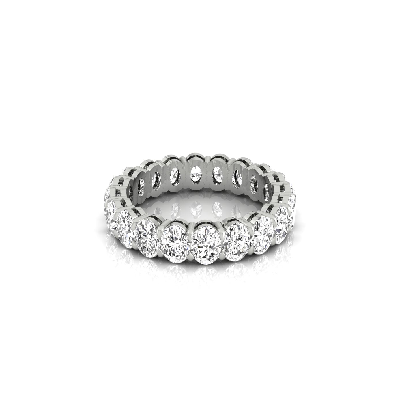 The Full Lab Grown Diamond Eternity Ring from Janet Heller Fine Jewelry, crafted in 18KT gold, features evenly spaced diamonds offered in various shapes and custom carat weights. The color of the diamonds is F and the clarity is VS. This is the perfect wedding band to be worn alone or stacked with your engagement ring.