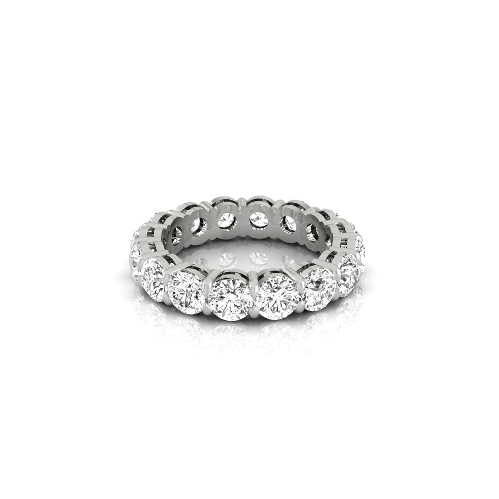 The Full Lab Grown Diamond Eternity Ring dazzles with a continuous circle of brilliant F Color VS Clarity diamonds, offering a luxurious and elegant appearance against the plain white background.