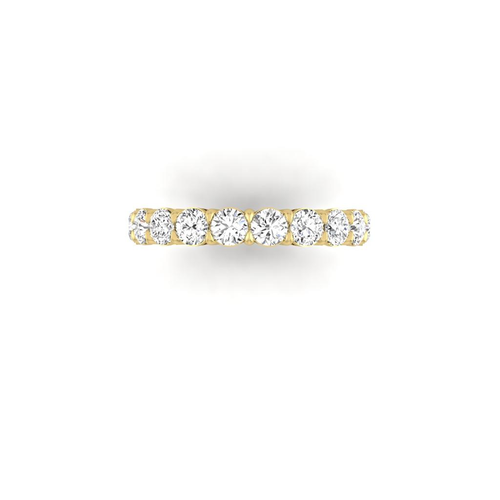 The Full Lab Grown Diamond Eternity Ring features 18KT gold with a row of F Color VS Clarity round, brilliant-cut diamonds on a white backdrop. The thin band enhances the sparkle and prominence of this exquisite piece.