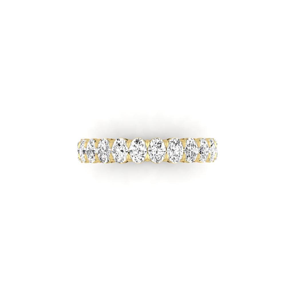 The Half Lab Grown Diamond Eternity Ring, custom-made from 18KT gold, features a row of sparkling round diamonds in a symmetrical pattern, elegantly displayed against a plain white background.