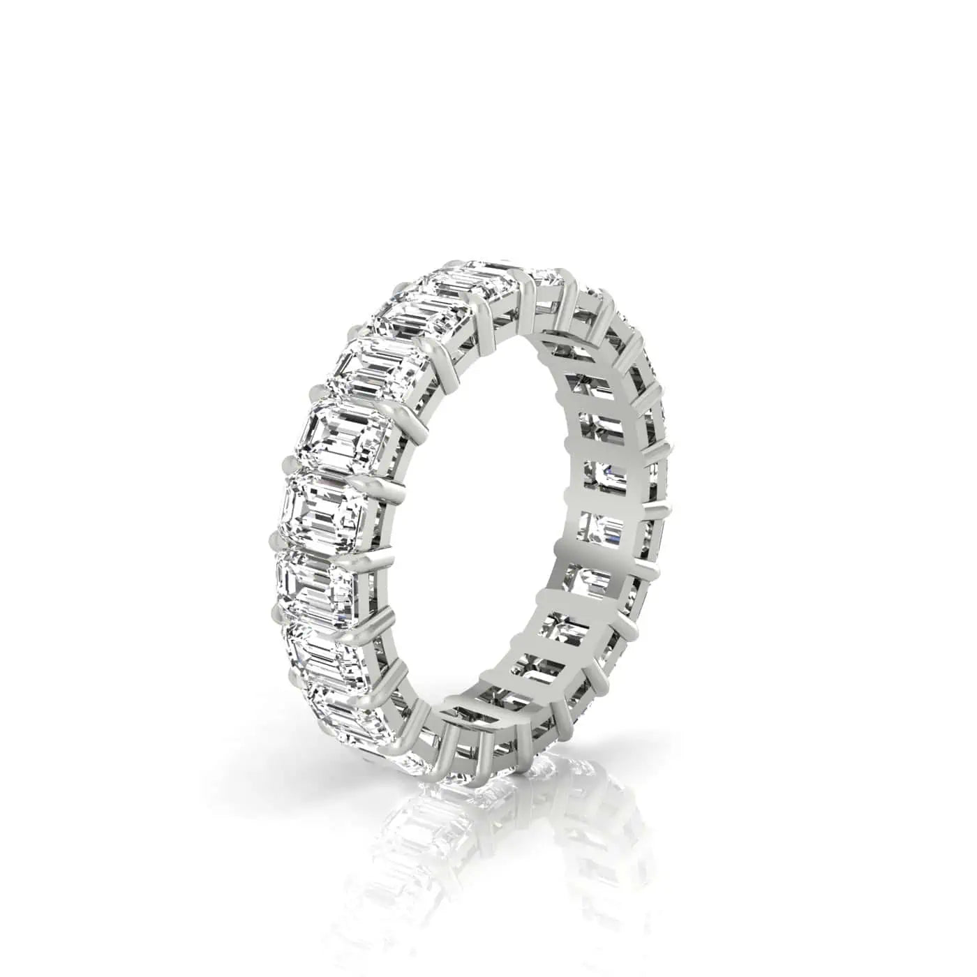 The Full Lab Grown Diamond Eternity Ring from Janet Heller Fine Jewelry, crafted in 18KT gold, features evenly spaced diamonds offered in various shapes and custom carat weights. The color of the diamonds is F and the clarity is VS. This is the perfect wedding band to be worn alone or stacked with your engagement ring.