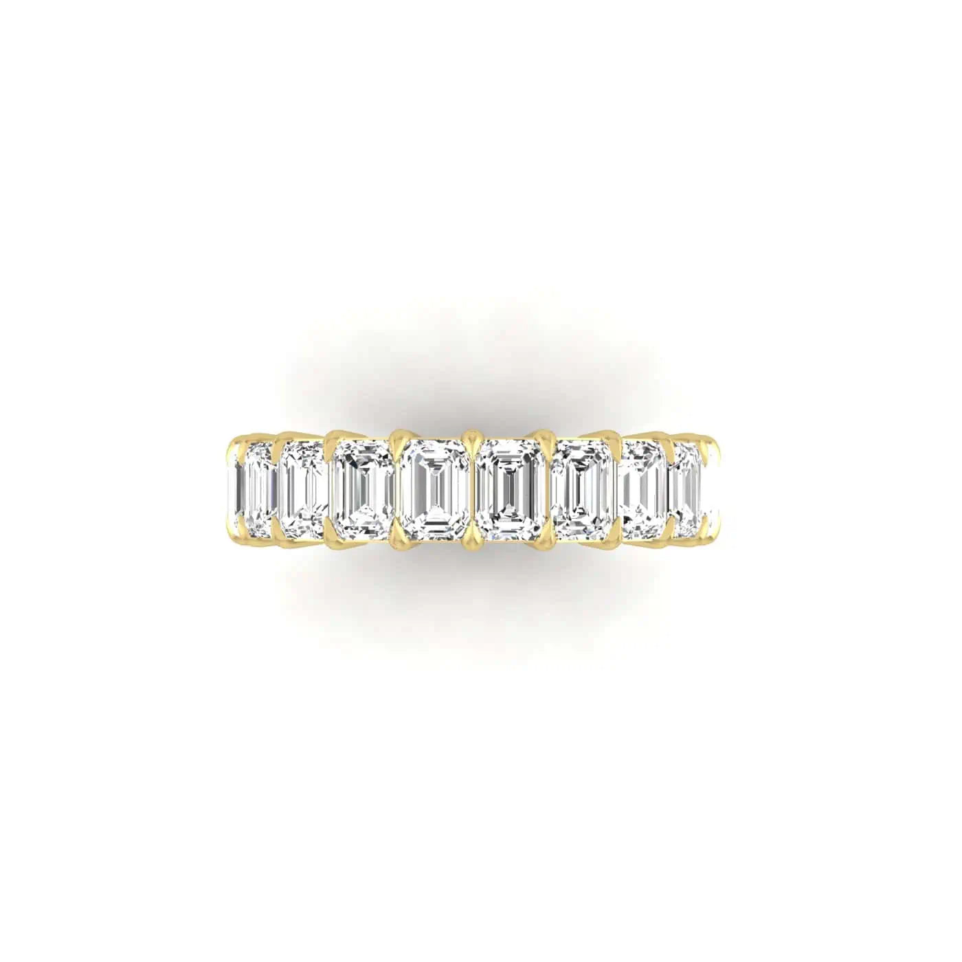 The Full Diamond Eternity Ring from Janet Heller Fine Jewelry is an 18KT gold eternity band with a continuous row of natural diamonds, offered in various shapes and carat weights. The color of the diamonds is F and the clarity is VS. This is the perfect wedding band to be worn alone or stacked with your engagement ring.