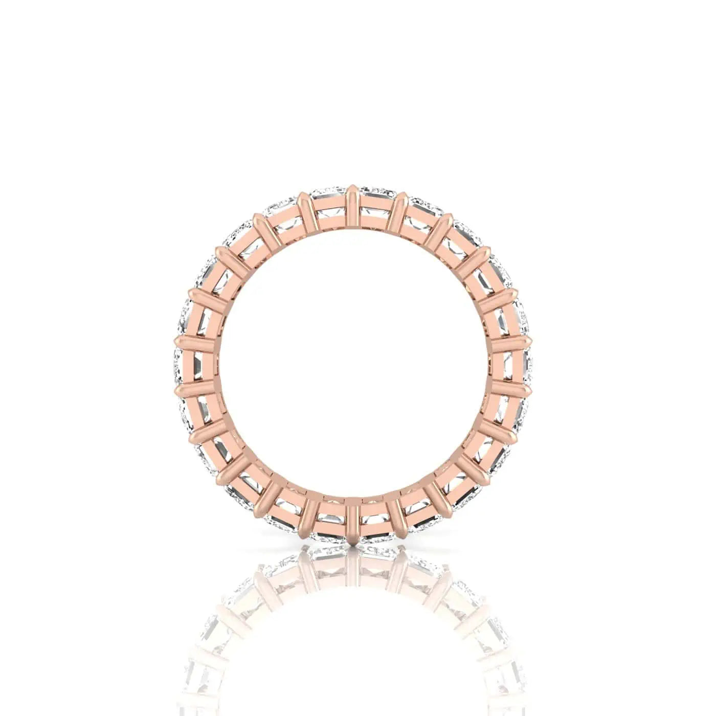 The Full Diamond Eternity Ring from Janet Heller Fine Jewelry, crafted in 18KT gold, features evenly spaced diamonds offered in various shapes and custom carat weights. The color of the diamonds is F and the clarity is VS. This is the perfect wedding band to be worn alone or stacked with your engagement ring.