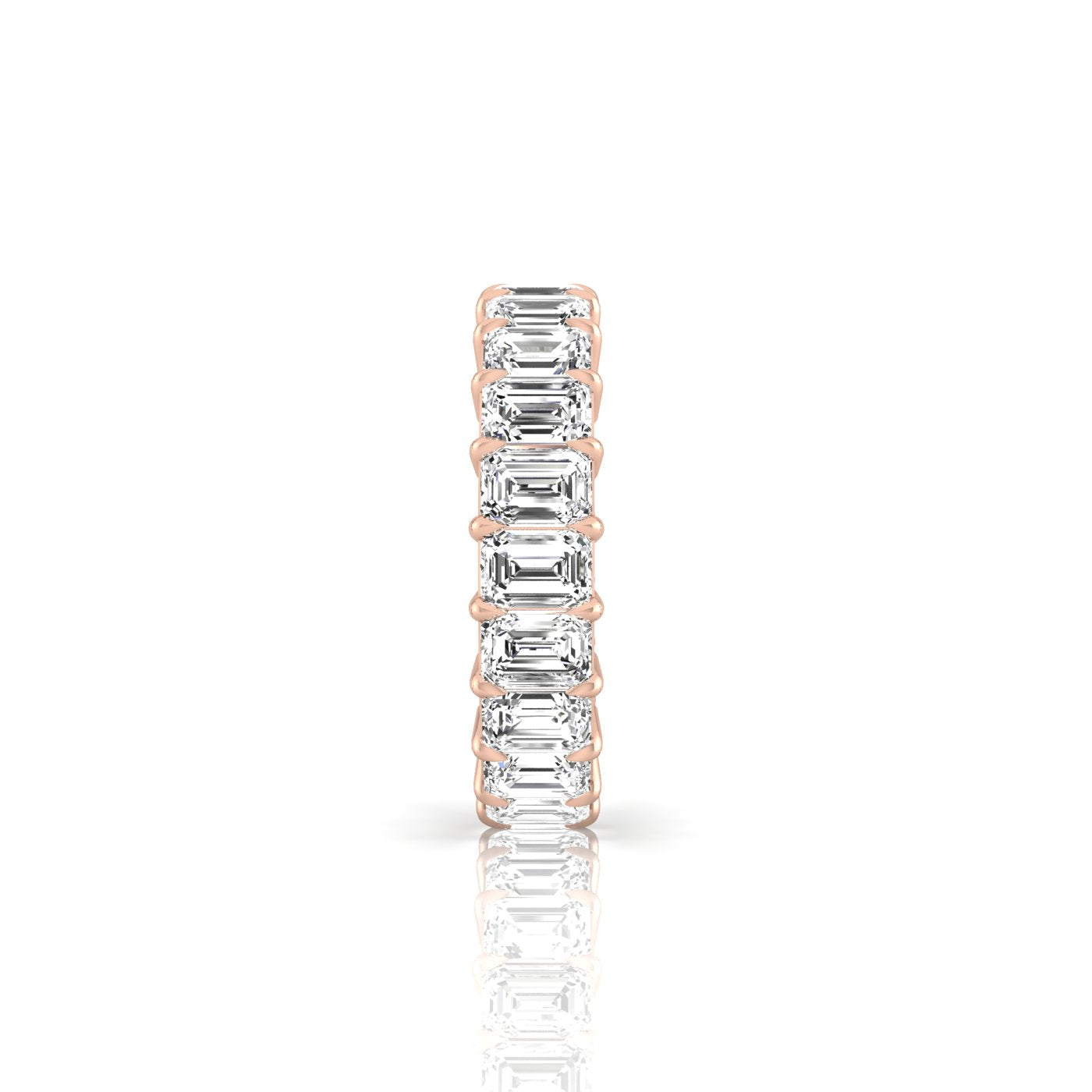 The Full Lab Grown Diamond Eternity Ring from Janet Heller Fine Jewelry, crafted in 18KT gold, features evenly spaced diamonds offered in various shapes and custom carat weights. The color of the diamonds is F and the clarity is VS. This is the perfect wedding band to be worn alone or stacked with your engagement ring.
