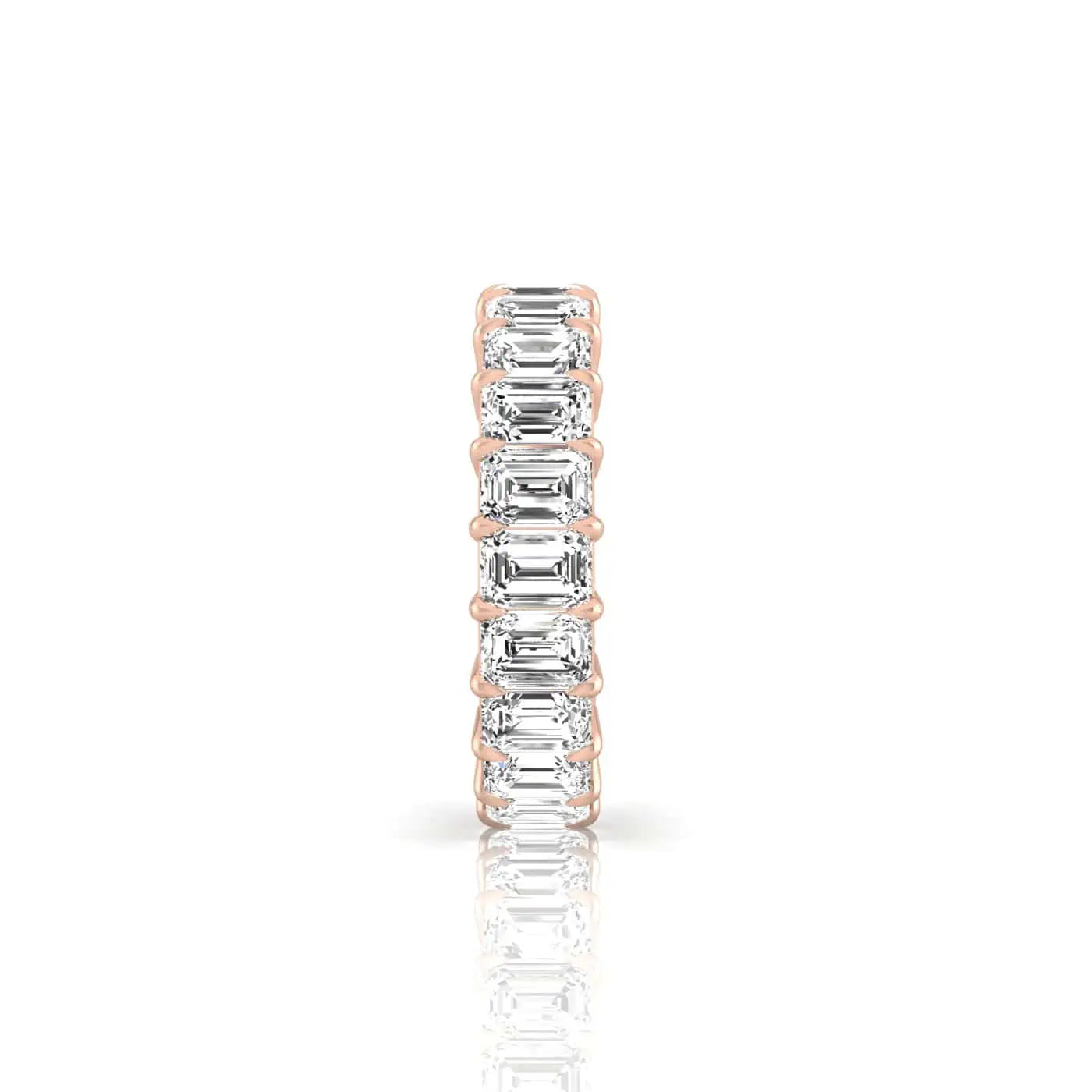 The Full Diamond Eternity Ring from Janet Heller Fine Jewelry, crafted in 18KT gold, features evenly spaced diamonds offered in various shapes and custom carat weights. The color of the diamonds is F and the clarity is VS. This is the perfect wedding band to be worn alone or stacked with your engagement ring.