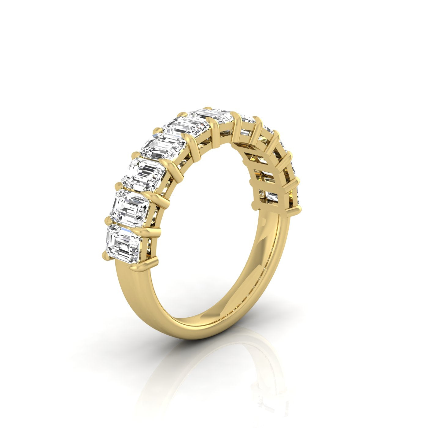 The Half Lab Grown Diamond Eternity Ring from Janet Heller Fine Jewelry, crafted in 18KT gold, features a row of evenly spaced diamonds offered in various shapes and custom carat weights. The color of the diamonds is F and the clarity is VS. This is the perfect wedding band to be worn alone or stacked with your engagement ring.