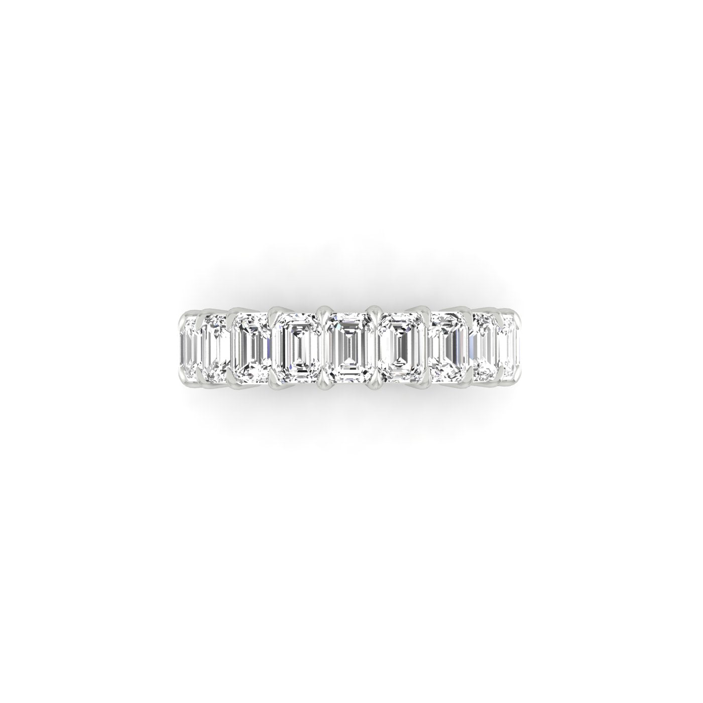The Half Diamond Eternity Ring features a row of rectangular-cut clear gemstones with VS Clarity set on an 18KT Gold band, beautifully contrasting against a plain white background.
