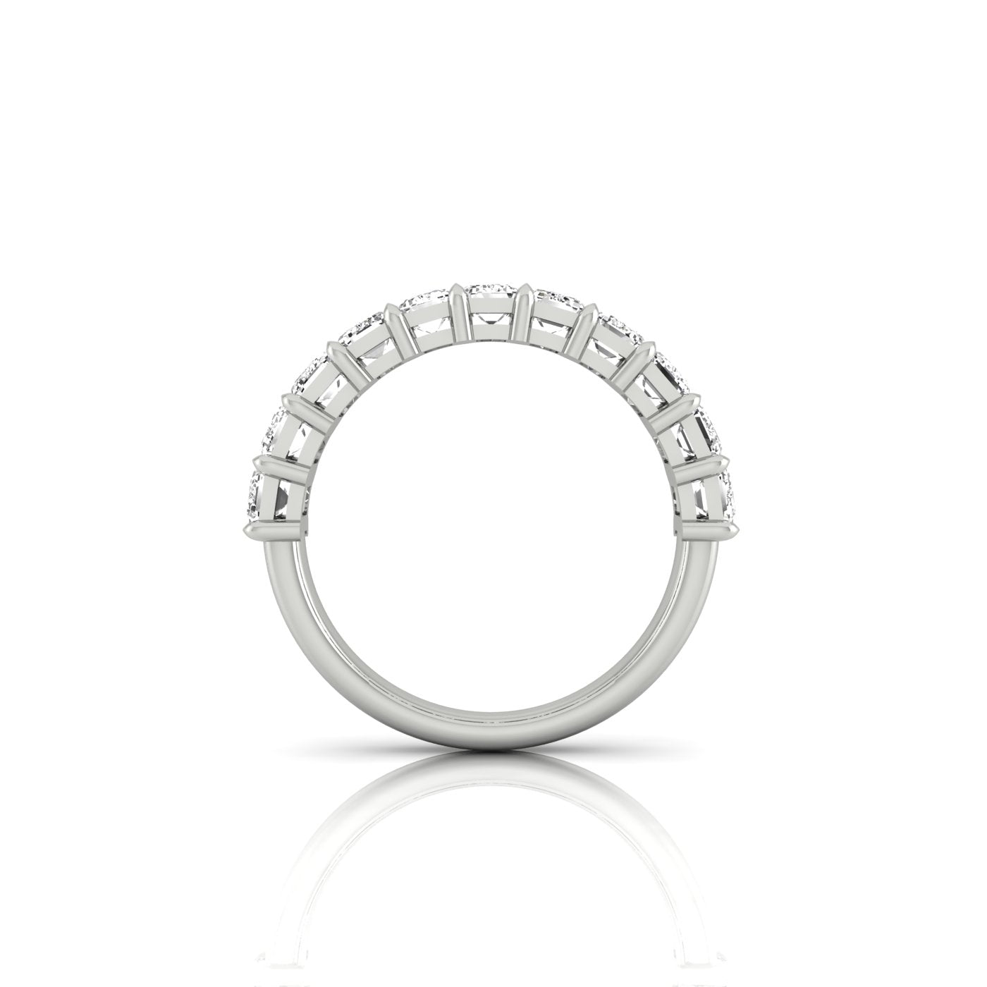 Silver Half Diamond Eternity Ring with square-cut diamonds of VS Clarity, set on the top half. The elegant band tapers beneath the settings, beautifully reflected on a white surface.