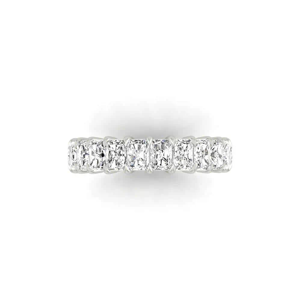 The Full Diamond Eternity Ring, a striking silver piece with 18KT gold accents, showcases F Color VS Clarity square-cut diamonds in a continuous band against a plain white background.