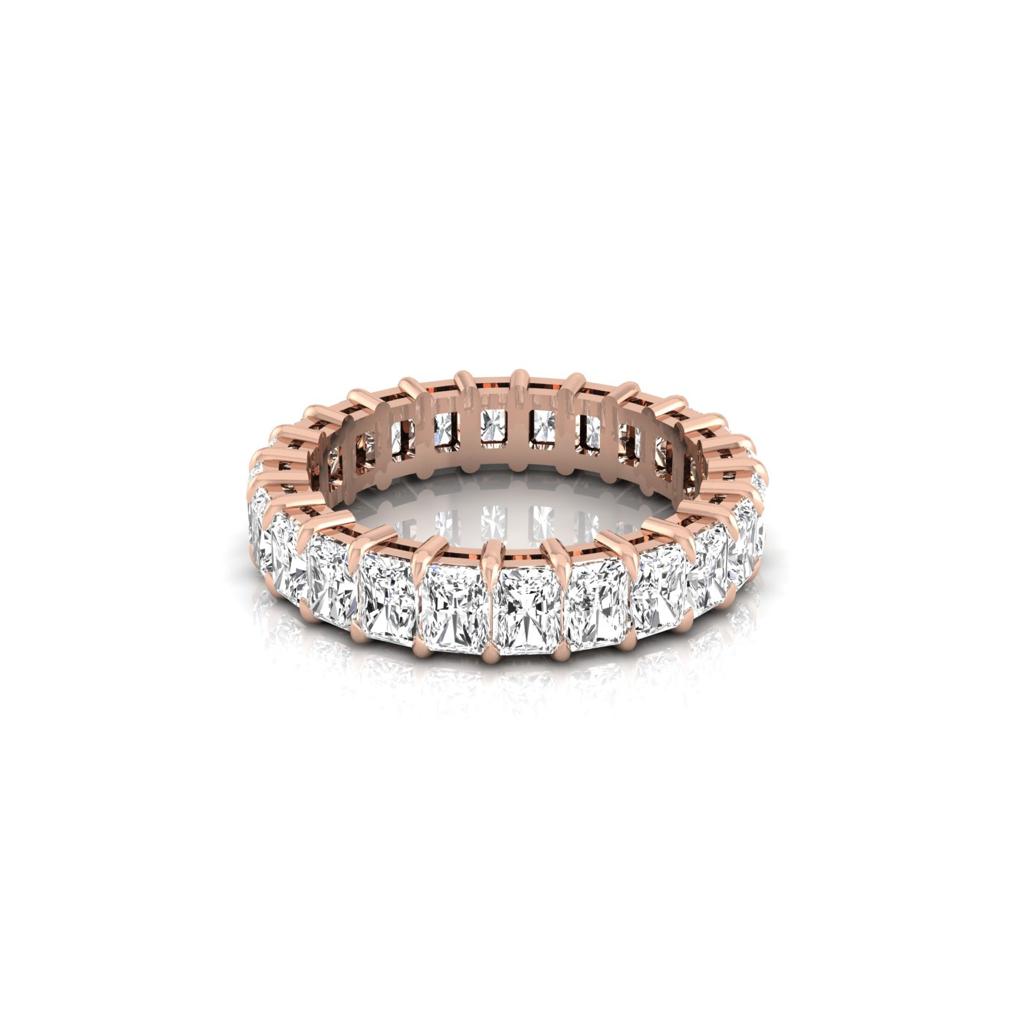 The Full Lab Grown Diamond Eternity Ring in 18KT rose gold features square-cut F color VS clarity diamonds, offering a sparkling and luxurious look against a plain white background.