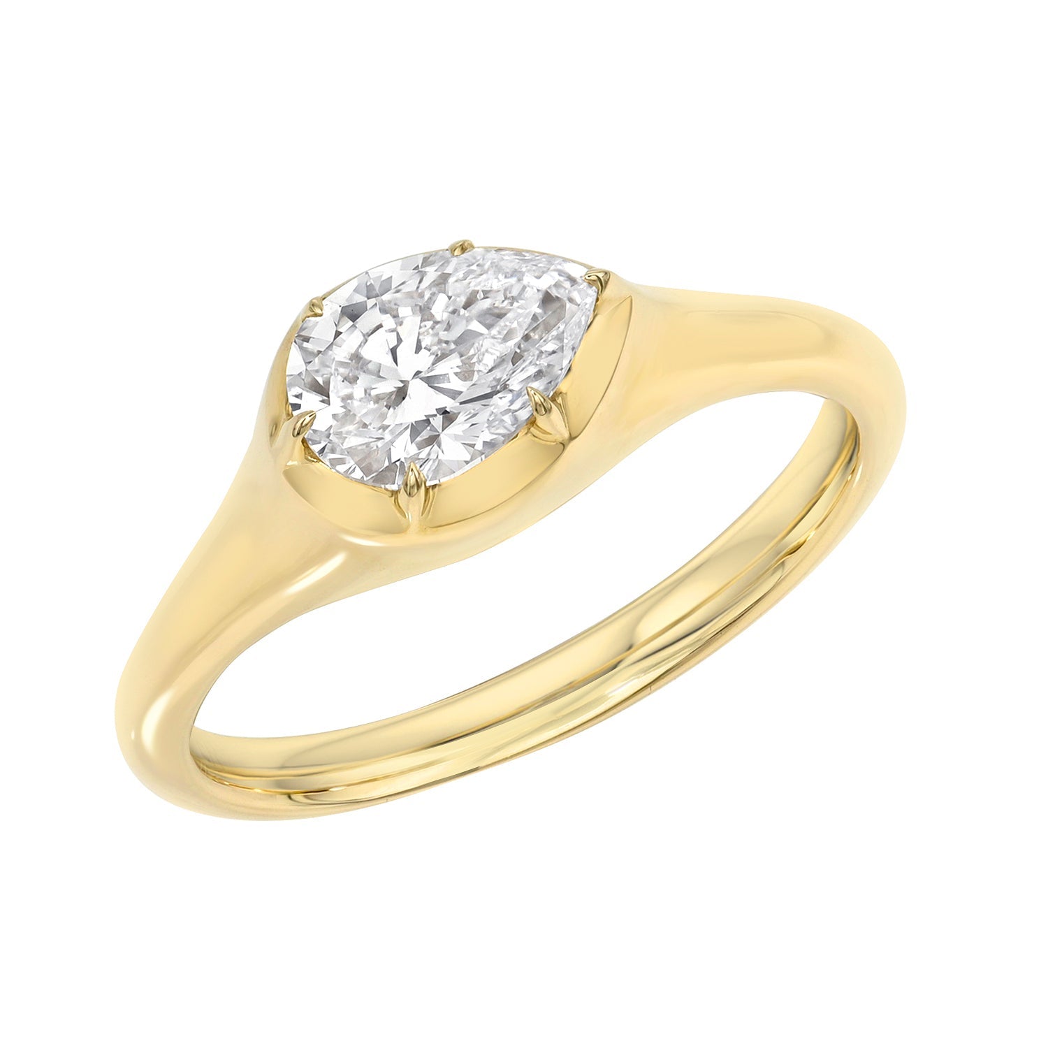 The Pear Lab Diamond Pinky Ring in yellow gold features a single pear-shaped lab diamond in a simple prong setting, displayed against a white background.