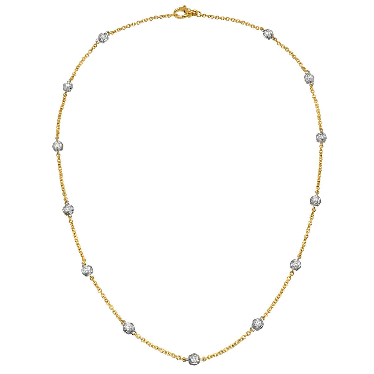 Reverie Rondel Necklace 17″ featuring gold-tone chain with evenly spaced, circular silver-toned charms.