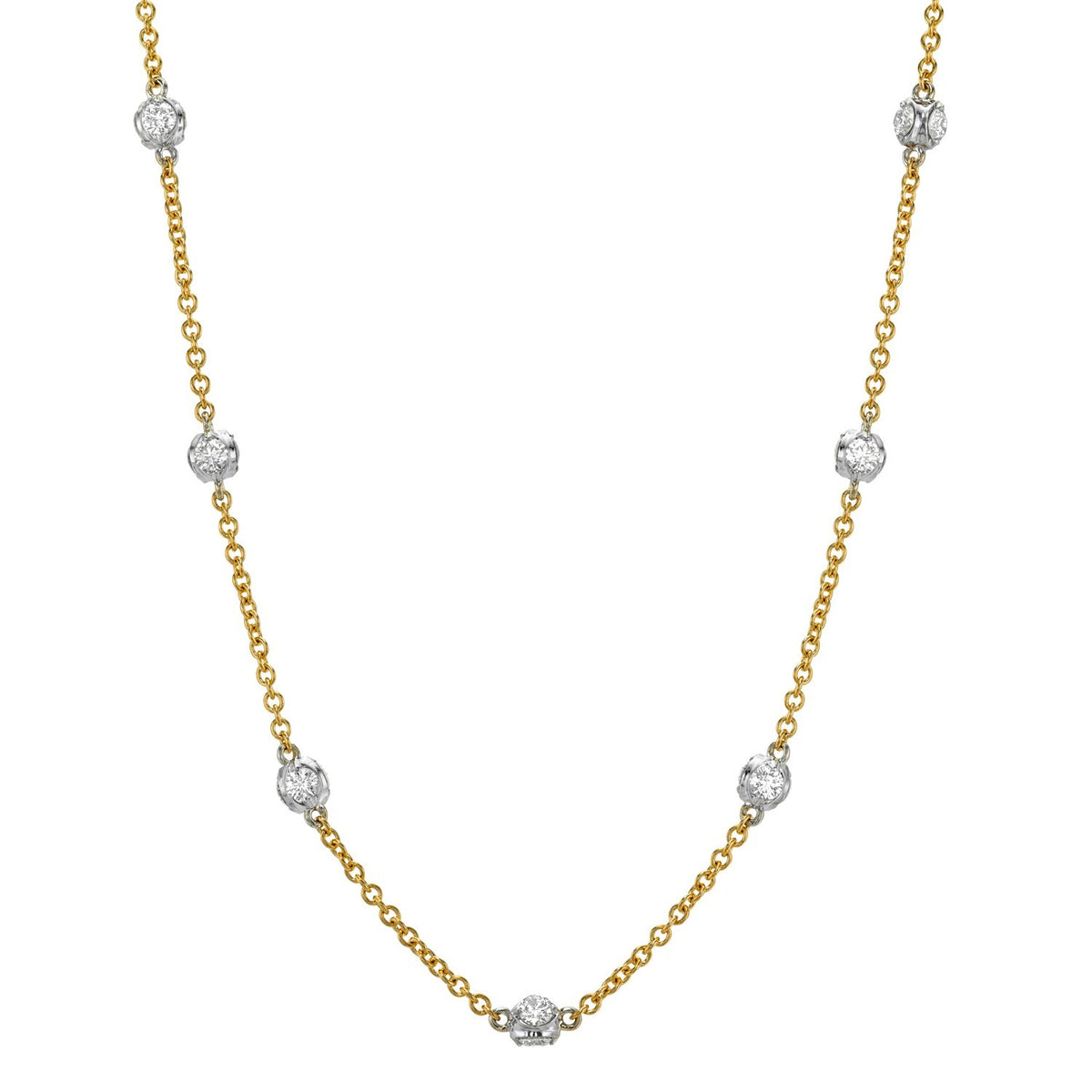 Reverie Rondel Necklace 26″ featuring a gold chain with evenly spaced, round diamond rondel stations.