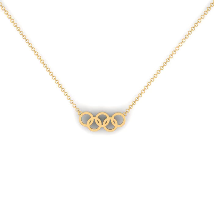 The Gold Rings Necklace by Janet Heller features five interlocking gold rings on a fine chain, shown against a white background—an elegant pre-order piece for fine jewelry lovers.