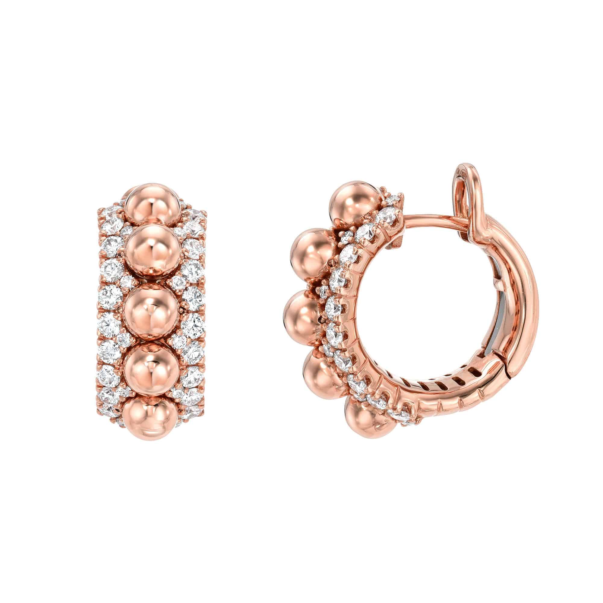 The Diamond Bauble Hoops from Janet Heller Fine Jewelry are rose gold earrings with a latch back closure. They feature alternating rows of small round diamonds and raised bead-like spheres for a textured, luxurious look.