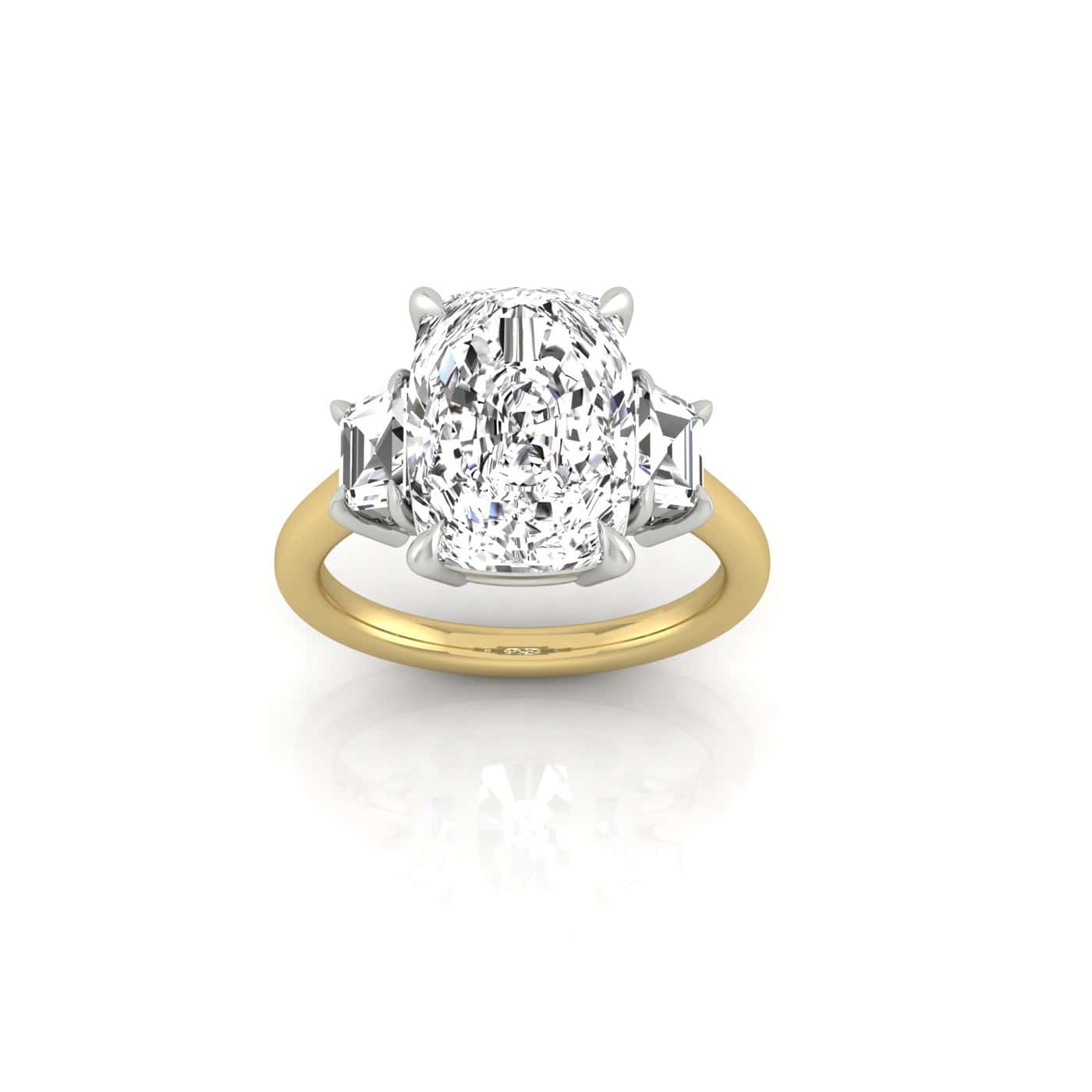 The Triad ring features a large oval-cut diamond at its center, enhanced by two smaller triangular diamonds in an elegant triad setting, all on a sleek 18KT Gold band.