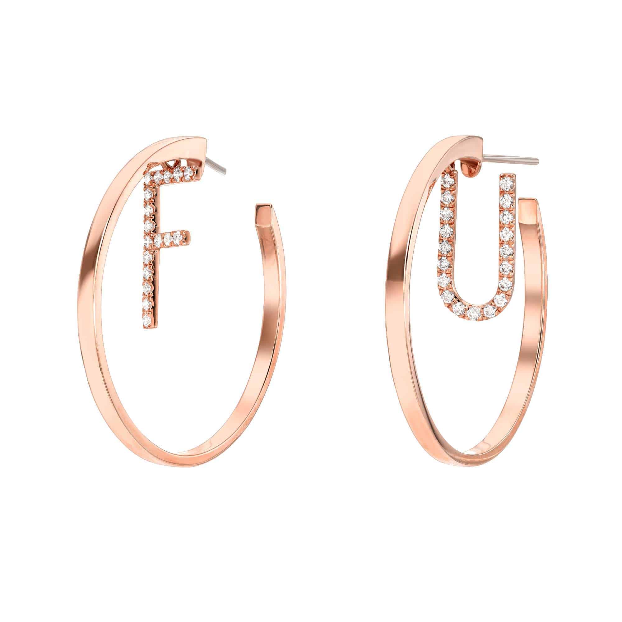 Diamond Letter Maeve Earrings: each gold hoop features a vertically embedded, crystal-studded letter—an F on the left and a U on the right. Custom letter options are available for preorder, letting you personalize your pair with your desired initials.