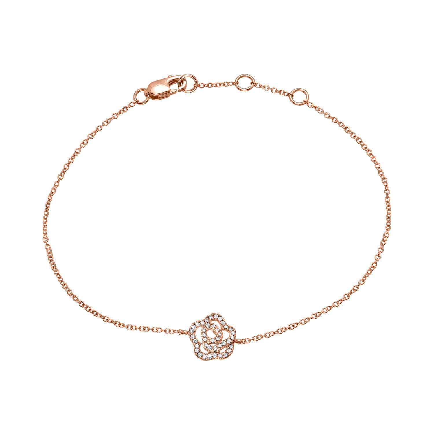Introducing the Diamond Rose Bracelet: a delicate gold bracelet featuring a small, rose-shaped charm adorned with diamonds, complete with a fine chain and secure lobster claw clasp.