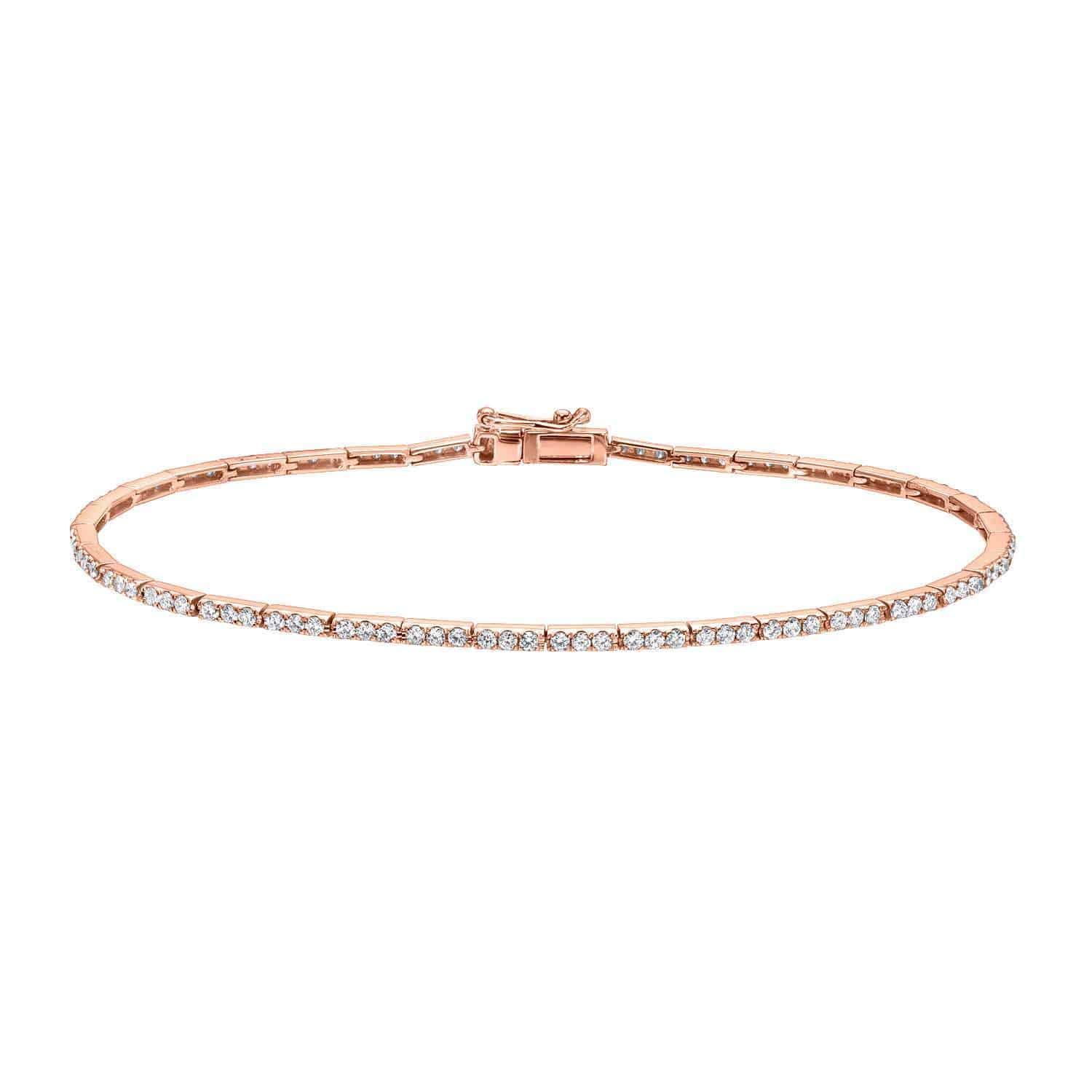 The Micro Diamond Tennis Bracelet, a delicate rose gold piece adorned with small, sparkling diamonds and showcased on a plain white background—a timeless creation from Janet Heller Fine Jewelry, celebrated for exquisite fine jewelry and exceptional custom craftsmanship.