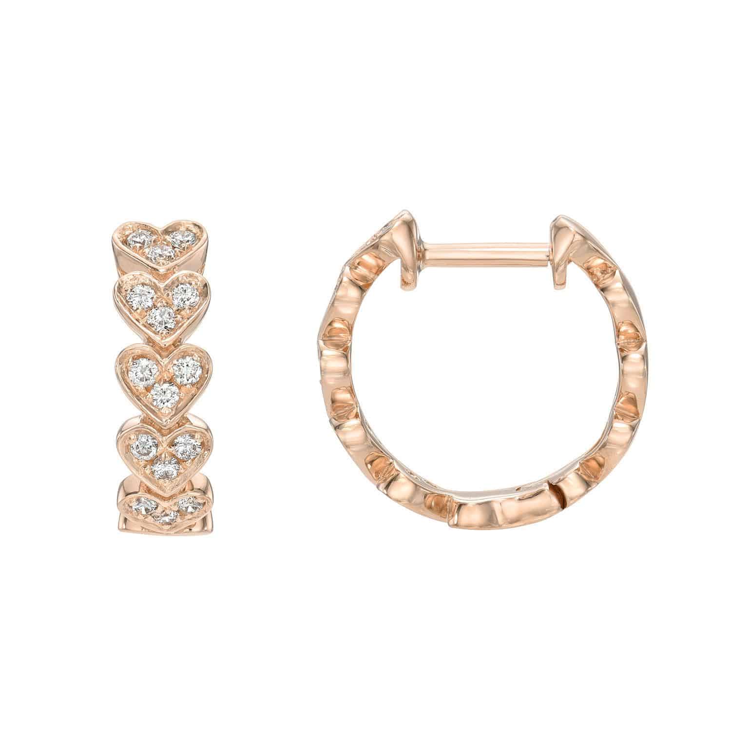Pair of Repeating Diamond Heart Huggies in rose gold from Janet Heller Fine Jewelry. One earring is shown from the front, featuring four stacked hearts accented with sparkling diamonds, while the other earring is displayed from the side to reveal its elegant textured hoop design—an exquisite example of custom jewelry craftsmanship.