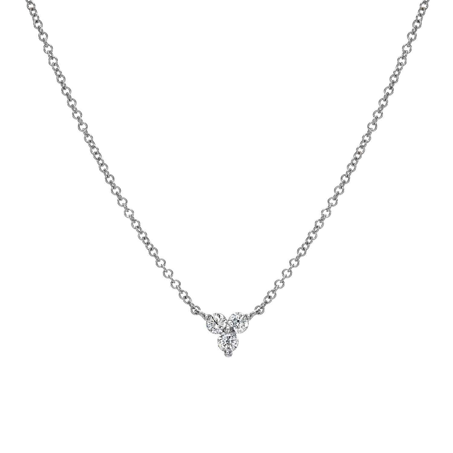 Introducing the Diamond Maisy Necklace from Janet Heller Fine Jewelry—a delicate silver piece featuring a V-shaped pendant adorned with three small, clustered round diamonds, gracefully suspended from a fine chain and displayed against a pristine white background. For inquiries about this jewelry or to discuss custom options, please contact us.