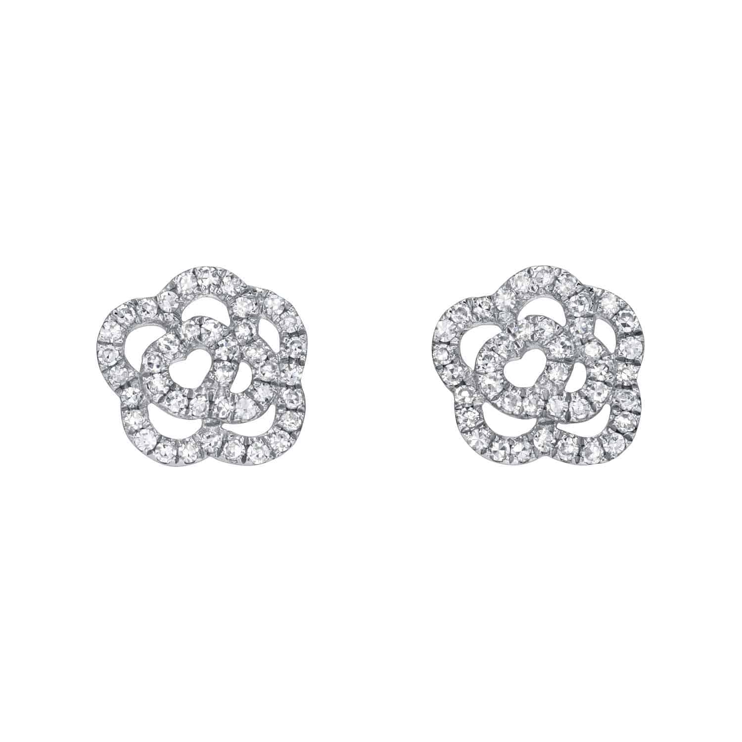 The Diamond Rose Studs from Janet Heller Fine Jewelry are crafted in 14KT gold. The flower design sparkles with diamonds. The studs can be worn on their own or layered along the ear with other earrings.