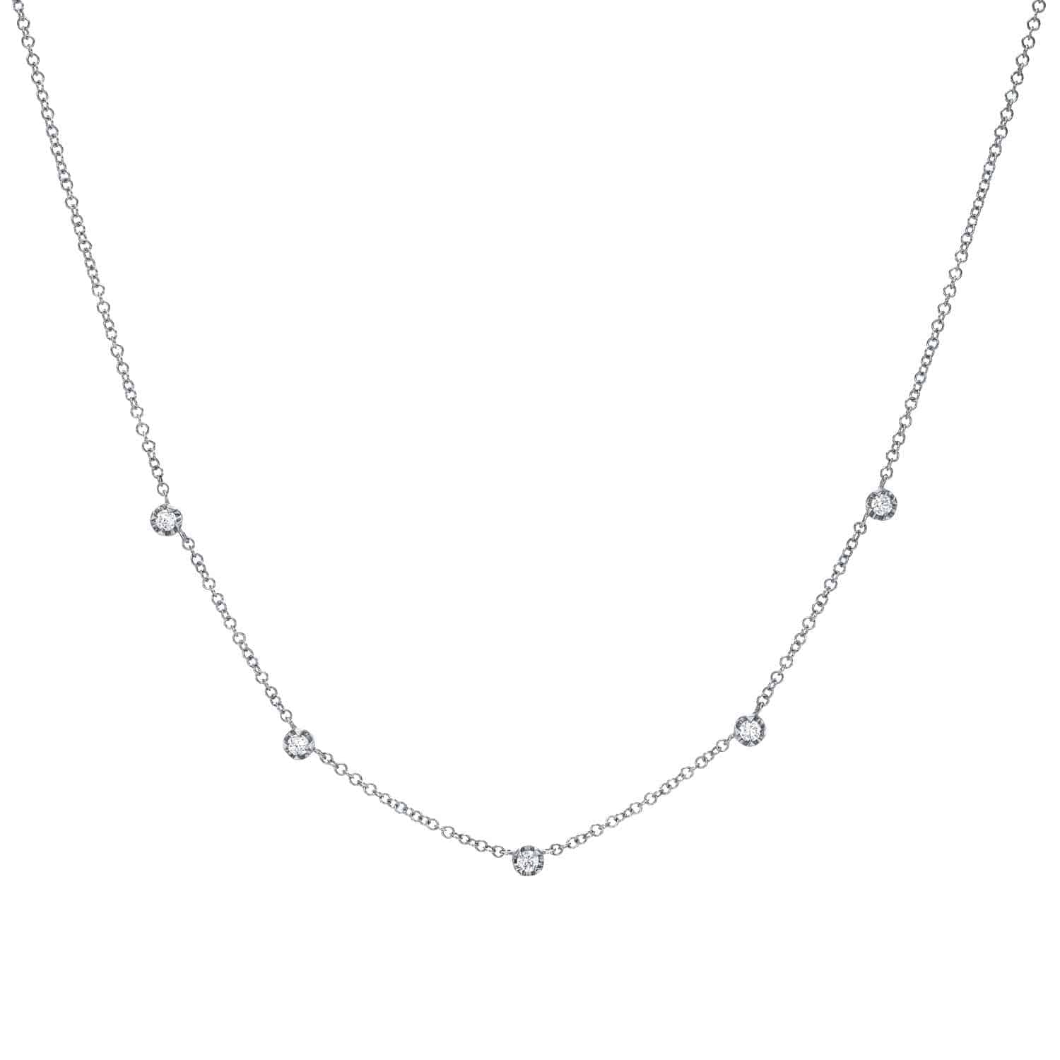 The Diamond Vienna Necklace from Janet Heller Fine Jewelry is crafted in 14KT gold.  The chain features 5 evenly spaced round diamonds.  The necklace can be worn on its own or layered with other chains.