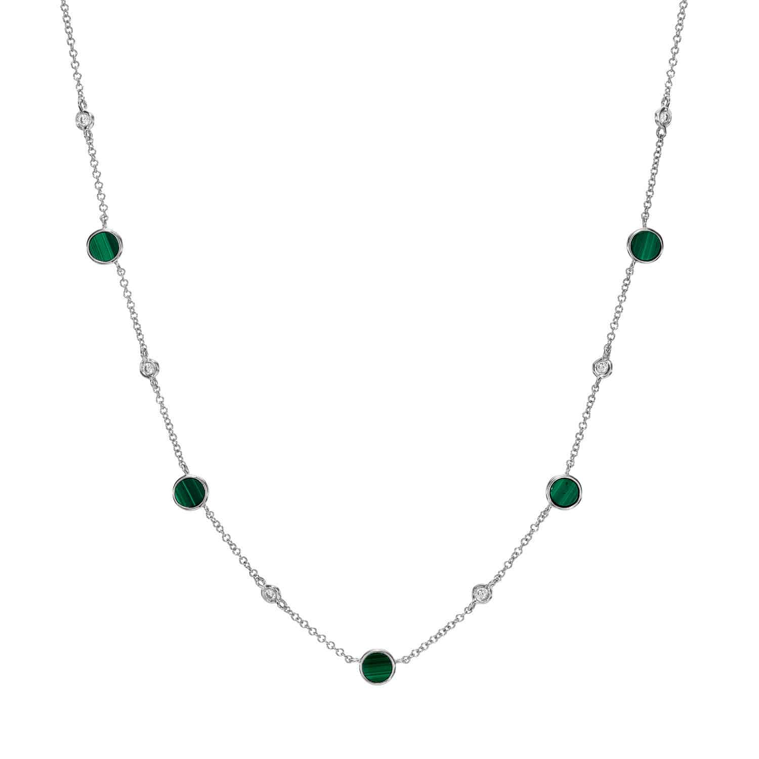 Experience elegance with the Malachite Piper Necklace, a delicate silver piece featuring alternating round green malachite stones and clear gemstones that are evenly spaced along the chain.