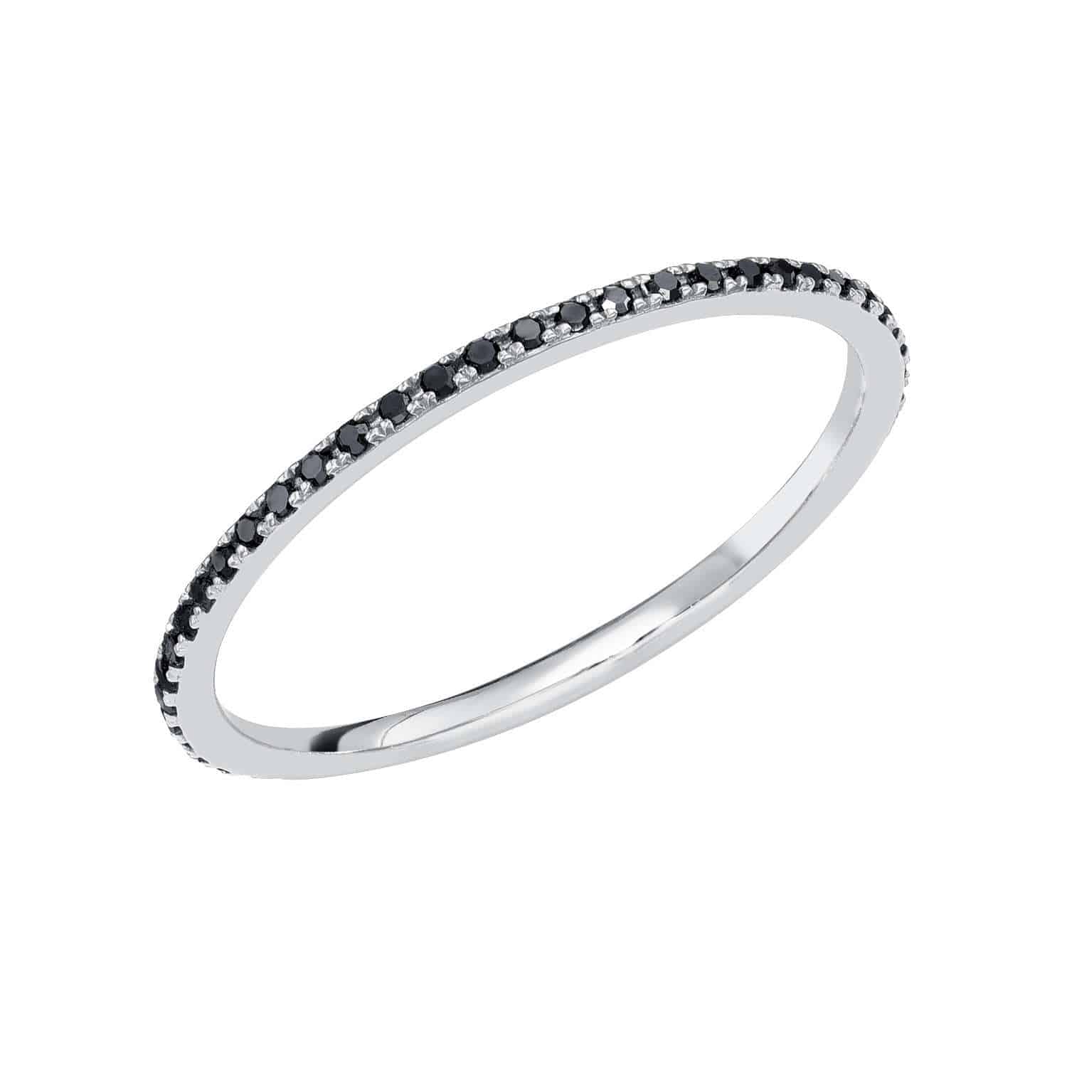 Introducing the Black Diamond Micro Pavé Eternity Ring—a slim silver band adorned with a single row of petite, round black diamonds set along the top half. This custom ring is tailored to your preferred ring size.