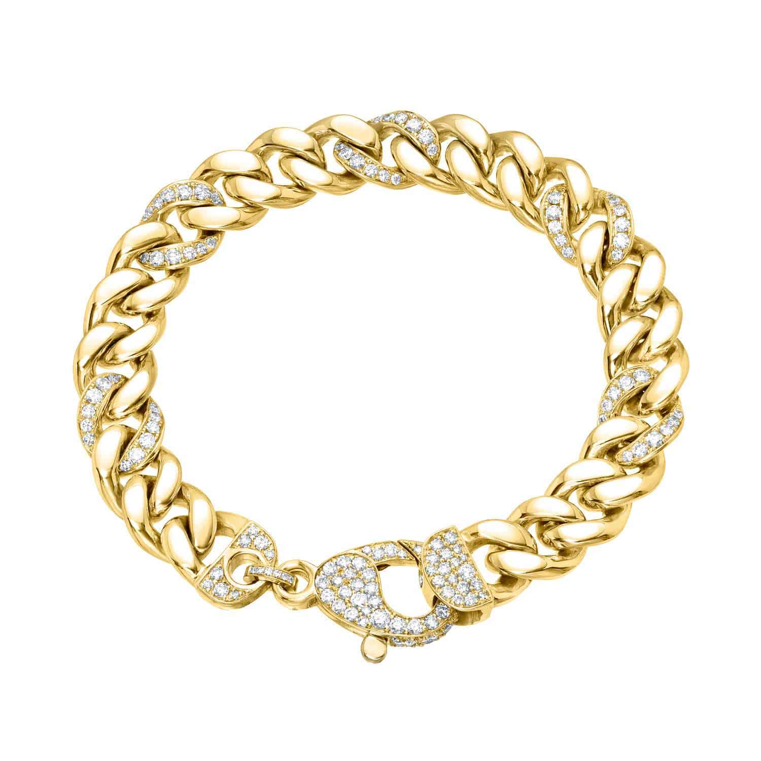 The Alternating Diamond Cuban Link Bracelet by Janet Heller Fine Jewelry is a bold, luxurious design featuring small diamonds on alternating links and a diamond-encrusted clasp, elegantly combining metal and gemstones for a stunning appearance.
