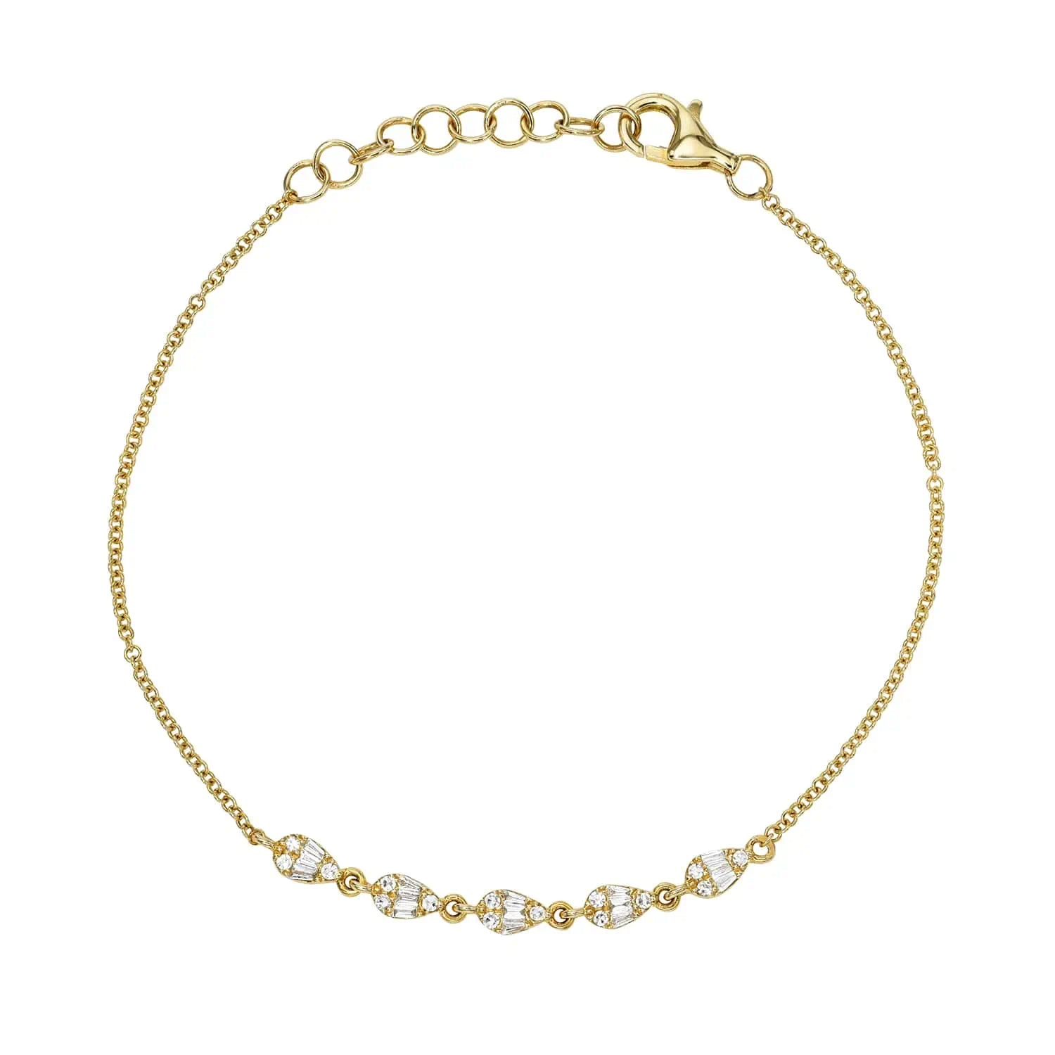 The Baguette Diamond Pear Shaped Bracelet from our exquisite jewelry collection features a gold chain with five diamond-studded, leaf-shaped charms and an adjustable clasp for a perfect fit.