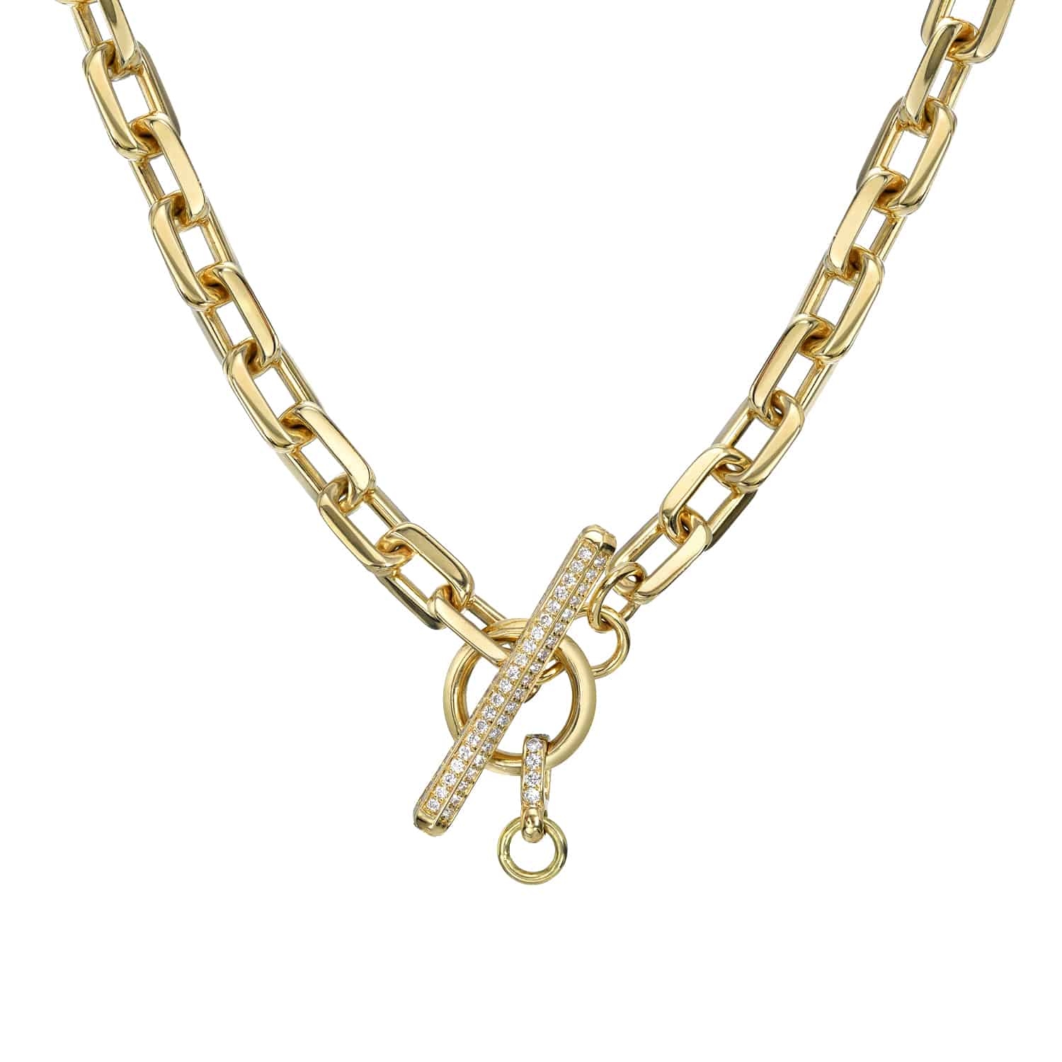 Introducing the Chunky Diamond Toggle Link Necklace by Janet Heller Fine Jewelry, featuring a rectangular toggle clasp adorned with small white gemstones. This elegant piece connects to a circular ring, offering a modern look that skillfully blends classic charm with contemporary style.
