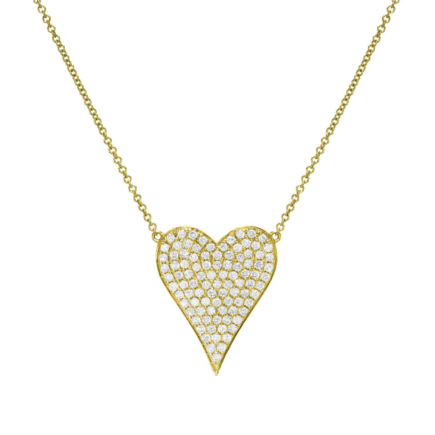 Introducing the Diamond Heart Alina Necklace: a gold chain necklace showcasing a bold, asymmetrical heart pendant encrusted with sparkling white diamonds—a breathtaking creation from Janet Heller Fine Jewelry. For custom jewelry options or inquiries about the Diamond Heart Alina Necklace, please contact us.