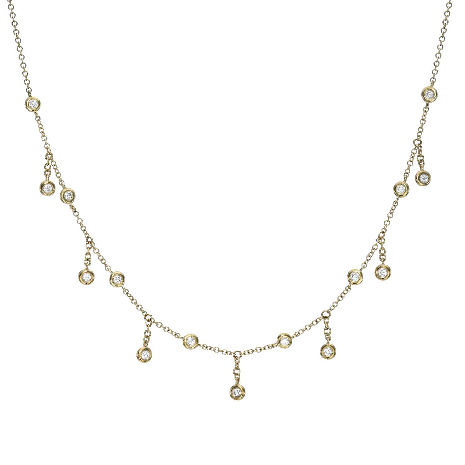 The Diamond Jesse Necklace features small, round, sparkling pendants evenly spaced along its chain. Some dangle slightly lower for a varied, elegant design. Displayed against a white background. Contact us for inquiries or customizations.