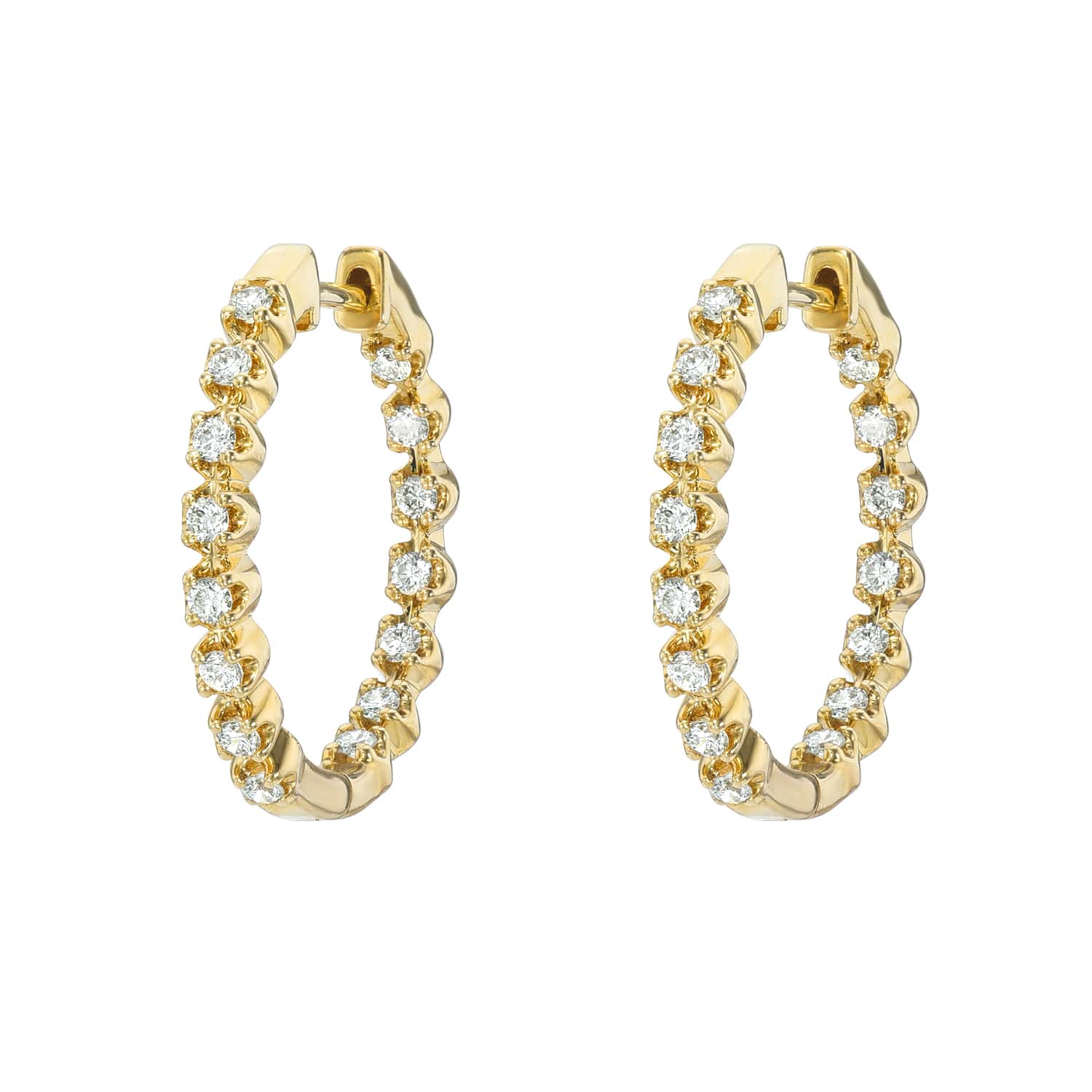 Explore the elegance of Janet Heller Fine Jewelry with the Diamond Leighton Hoops. These gold earrings, adorned with small round diamonds set closely around each hoop, feature a smooth and shiny finish for a timeless sparkle.