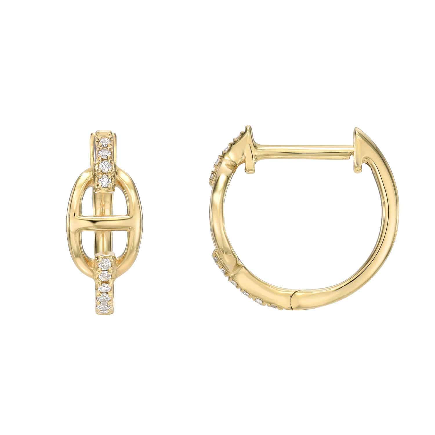 The Diamond Link Evie Huggies from Janet Heller Fine Jewelry are crafted in 14KT gold. The earrings feature a link design connected by diamonds. The small hoops can be worn alone or layered along the ear with other earrings.