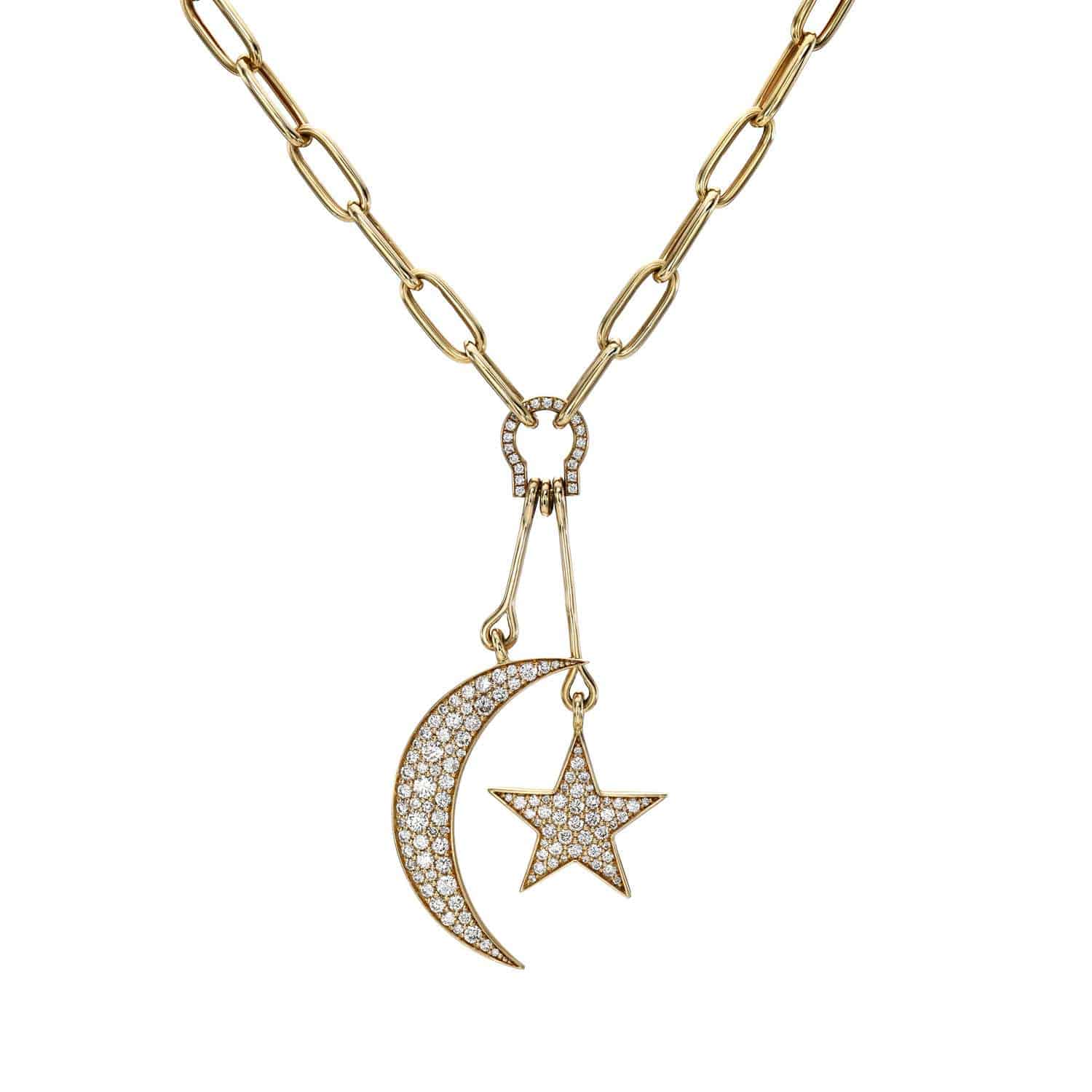 The Italian Link Moon & Star Necklace features elongated gold links with two pendants—a crescent moon and a star—adorned with sparkling stones. This celestial-themed jewelry offers customization options; please contact us for inquiries.