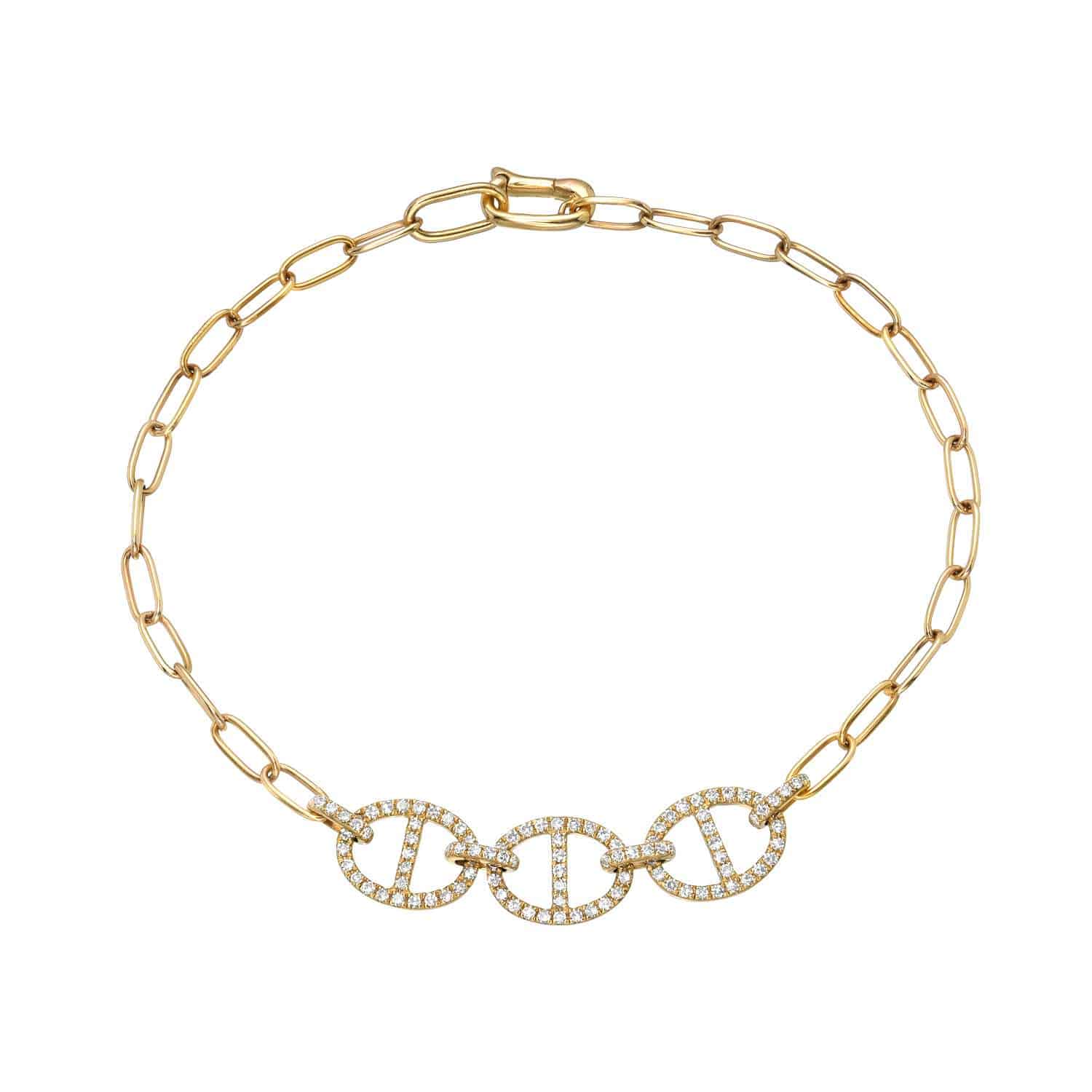 The Diamond Presley Bracelet from Foundry Fine Jewelry is a stunning gold chain bracelet with elongated links, featuring a centerpiece of three intertwined circles adorned with sparkling stones. It offers versatile customizations and features a secure lobster clasp, perfect for any occasion.