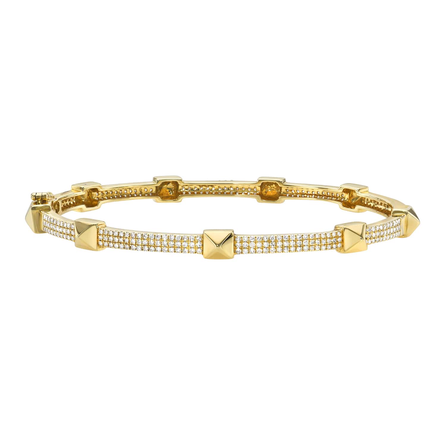 The Pyramid Bangle from Janet Heller Fine Jewelry is crafted in 14KT gold. The bracelet features rows of small diamonds and evenly spaced pyramid-shaped gold studs. The bangle can be worn on its own or layered with other bracelets.