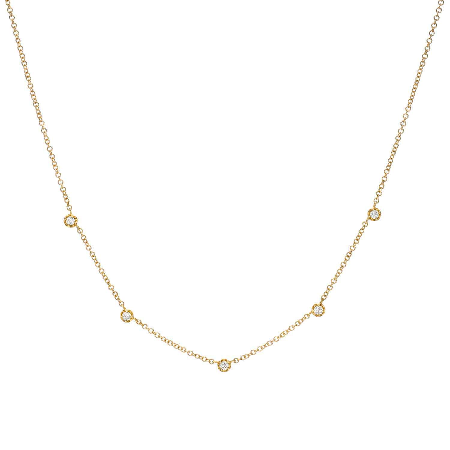 The Diamond Vienna Necklace features a delicate gold chain adorned with five evenly spaced small round diamonds along the front. This simple, elegant, and minimalistic fine jewelry design by Janet Heller Fine Jewelry is showcased on a white background. Price: $578.00.