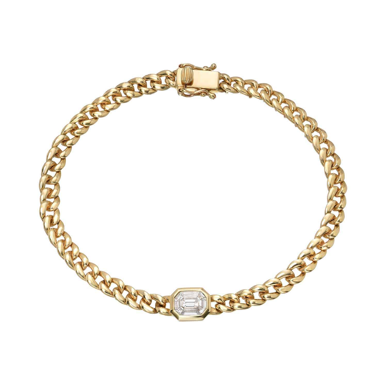The Emerald Cut Naomi Bracelet from Janet Heller Fine Jewelry is crafted in 14KT gold.  It features an emerald-cut diamond on a gold chain.  The bracelet can be worn on its own or stacked with other bracelets.