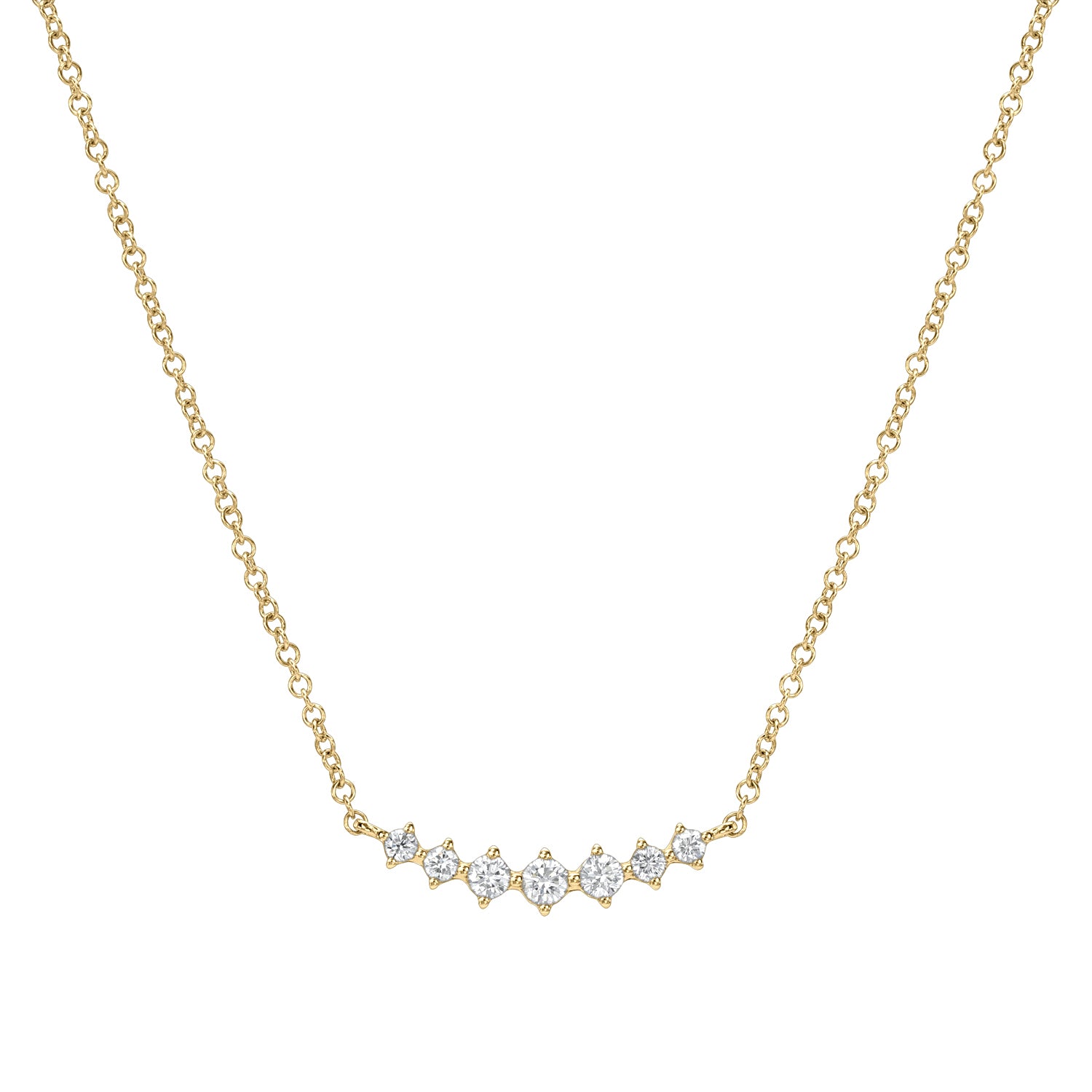 This Janet Heller Fine Jewelry Graduating U Shaped Diamond Necklace, set on a simple gold chain, features seven small sparkling diamonds in a gentle curve, embodying refined and understated allure.