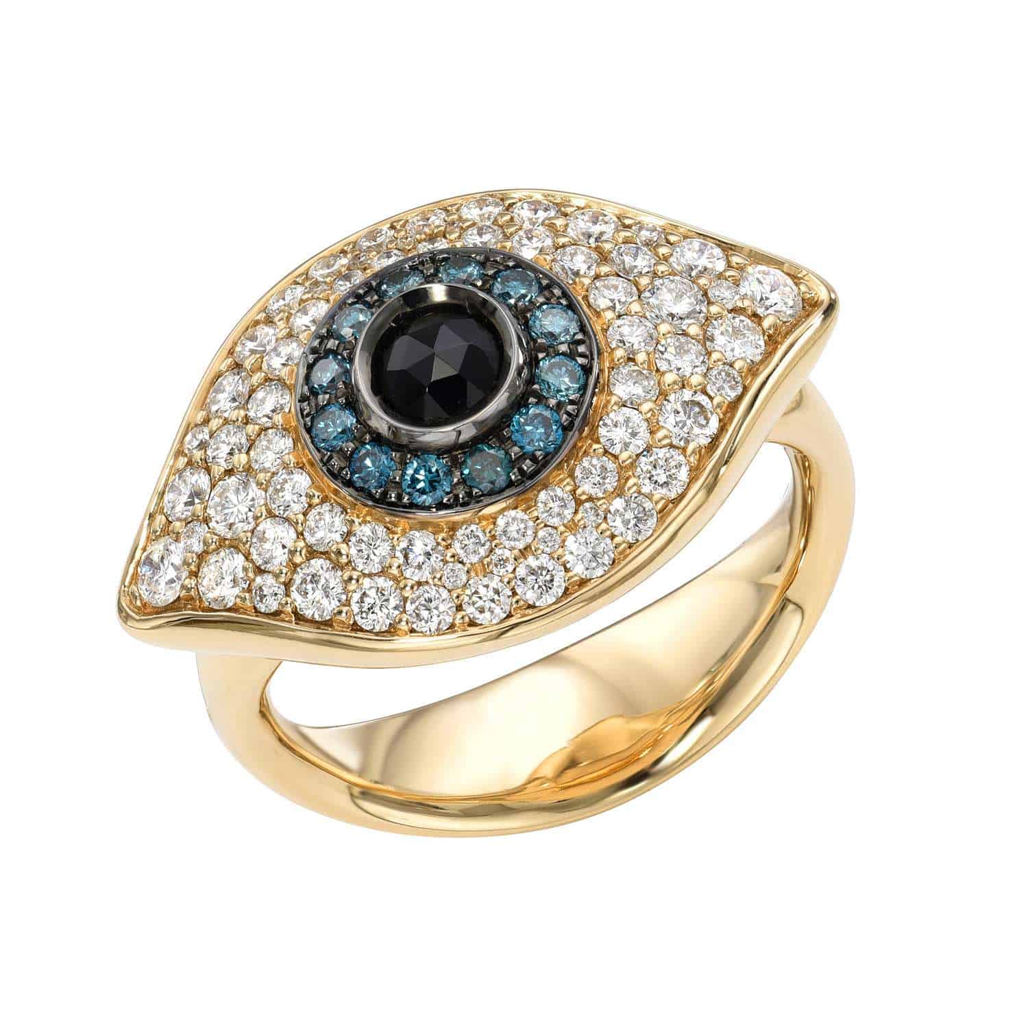 The Large Diamond Evil Eye Ring, crafted in fine jewelry style, features a gold eye design with a central black gemstone, surrounded by smaller blue stones and clear sparkling accents. This creates a vivid and intricate look. Available now for preorder.